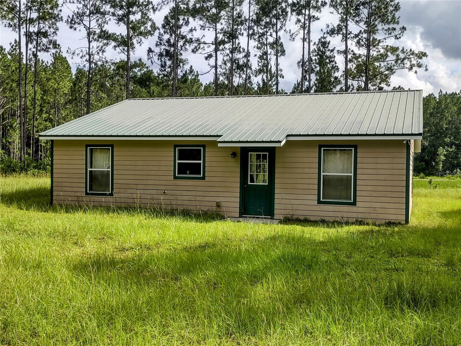 LOCATION! WINDING RIVER PRESERVE Come and enjoy all the outdoors has to offer, hunting, fishing a great place to come and relax. This property has great hunting consisting of deer, turkey, wild hogs and Great hard to find private Lake/River for Duck hunting with many different species of Ducks available. Many natural ponds and creeks in the area. The property is surrounded by approx. 12000 acres for hunting enthusiasts. An outdoor lovers dream.  This is a gated community, so it is very private. There is a small cabin located on the property, it has 3 bedrooms and 1 bath, very cozy and everything you need to enjoy this property.  Whether you want to hunt or just enjoy the wildlife, this is the place to be. A must see!