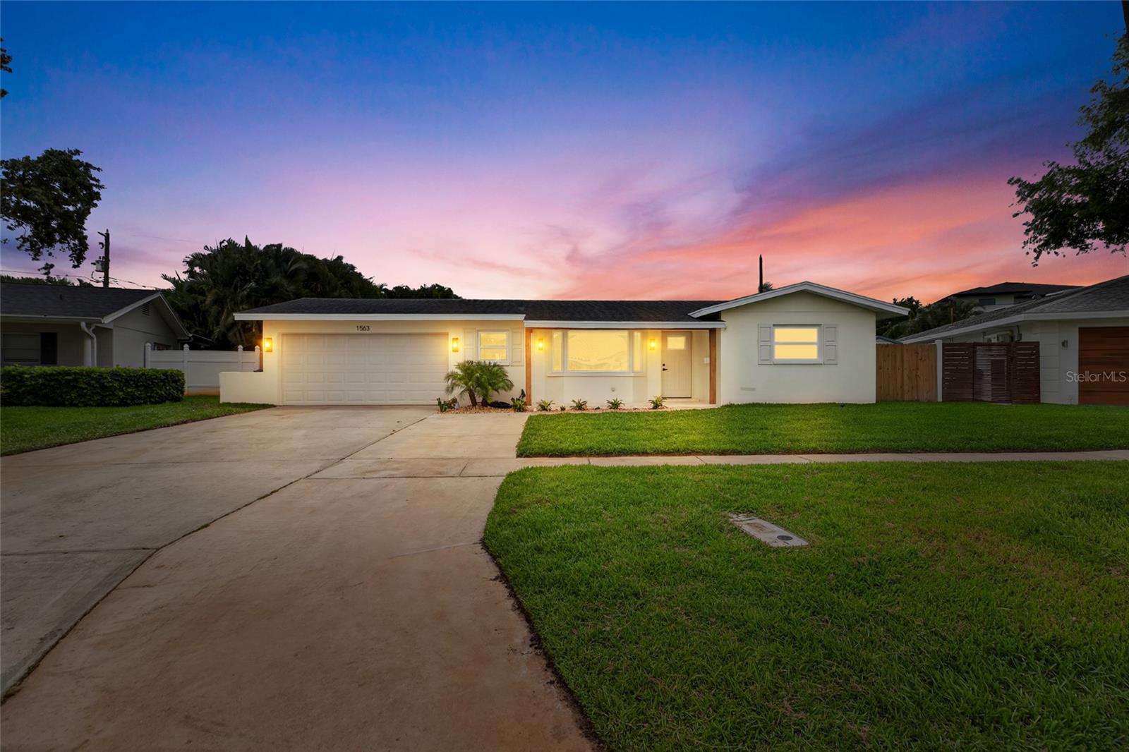 BEAUTIFULLY REMODELED AND MOVE IN READY IN THE HEART OF SNELL ISLE. Welcome to 1563 Eden Isle Boulevard NE, an exceptional four-bedroom, two-bath residence located in one of Northeast St. Petersburg’s most desired neighborhoods. Situated on an oversized lot of nearly 10,000 square feet, this stunning home offers approximately 2,328 square feet of thoughtfully designed living space, combining timeless style, modern upgrades, and an unbeatable location.



Designed for both comfortable everyday living and effortless entertaining, the desirable split-bedroom floor plan features spacious living areas, including separate living and family rooms, a dedicated dining space, and seamless indoor-outdoor flow. At the center of the home is a beautifully remodeled chef’s kitchen showcasing solid wood cabinetry, marble countertops, premium Café appliances, a large center island with seating, and abundant storage.



The private primary suite serves as a relaxing retreat with its own dedicated air conditioning system, a spa-inspired bath featuring dual vanities, a freestanding soaking tub, a glass-enclosed shower, and a custom walk-in closet designed for both style and functionality. Three additional bedrooms provide flexibility for family, guests, or a home office.



Step outside to a private backyard retreat complete with a paver patio and pergola, creating the perfect setting for outdoor dining, entertaining, or enjoying Florida’s year-round sunshine. Additional highlights include impact-resistant windows and sliding doors, recessed lighting throughout, an indoor laundry room, and extensive updates that make this home truly move-in ready.



Located in the prestigious Snell Isle community, this home is just minutes from vibrant downtown St. Petersburg, waterfront parks, golf courses, marinas, award-winning restaurants, shopping, museums, and the Gulf Coast’s world-renowned beaches. Rarely does a home combine this level of quality, location, and lifestyle in one of St. Petersburg’s premier neighborhoods.