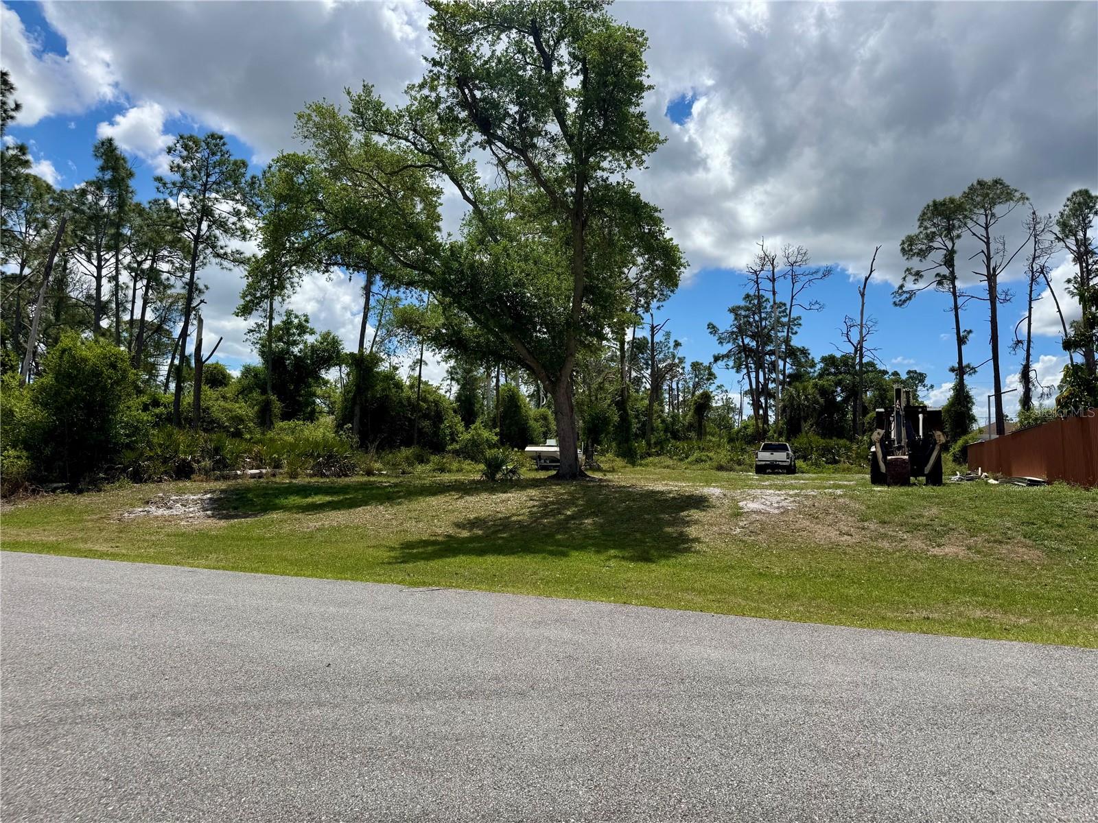 Discover an incredible opportunity to own a 0.23-acre residential lot in the highly desirable city of North Port, one of Southwest Florida’s fastest-growing areas. Located in a well-established neighborhood surrounded by new construction, this property is ideal for building your custom dream home or securing a smart long-term investment. This cleared, elevated lot making it builder-friendly and cost-efficient. Even better, two adjacent lots are also available, offering a rare chance to own three side-by-side parcels—perfect for a larger estate, family compound, or future development opportunity. Enjoy a prime location with convenient access to major routes including US-41 and Interstate 75, making commuting and travel a breeze. You’ll be just minutes from top-rated schools, shopping centers, grocery stores, restaurants, and everyday essentials. Live close to some of the area’s top attractions, including Wellen Park, Atlanta Braves Spring Training facilities, stunning Gulf Coast beaches, boating access, and world-class fishing. Nearby recreational highlights include Warm Mineral Springs and the North Port Aquatic Center. No HOA, No CDD fees, and located outside of a Scrub Jay zone as of April 2026 (buyer to verify with county during due diligence). Whether you're ready to build now or invest for the future, this property offers flexibility, location, and value. Secure your piece of Florida paradise today—opportunities like this don’t last.