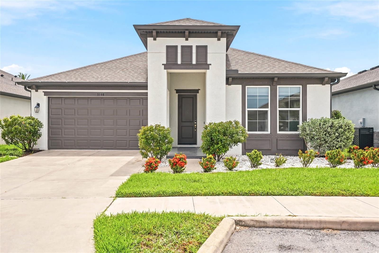 WELCOME HOME to your own slice of paradise! This move-in ready gem built in 2022 in the highly desirable Hidden Creek community checks every box: LOW HOA fees, NO CDD, ON CITY WATER/SEWER, BEST SCHOOL DISTRICT and most importantly, NO FLOOD ZONE! Step inside this spacious split-bedroom, open-concept home and feel the pride of ownership throughout. You're welcomed by an enormous living room with soaring ceilings and a gorgeous view. The kitchen is both functional and stylish, featuring granite countertops, stainless steel appliances and generous counter and cabinet space, flowing seamlessly into the adjacent dining room.  Newer laminate flooring runs through the living room and every bedroom of the home, adding a fresh, cohesive feel. The master suite is a true retreat, featuring a large walk-in closet with a custom closet system and its own private en-suite bath. Out back, unwind on the oversized screened lanai overlooking the community park, and enjoy a fully fenced backyard perfect for kids and furry friends alike. Boasting 1,901 heated square feet, this home is just minutes from I-75, shopping, dining, and the world-renowned Gulf beaches of Southwest Florida. Don't miss this rare combination of value, location, and peace of mind, schedule your showing today! **This home qualifies for a 1% lender incentive when using the preferred lender**