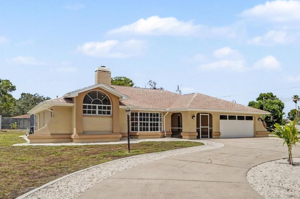 Completely and Professionally remodeled!!!!     This is a beautiful Florida Pool
home that checks off all the boxes with a new acrylic pool and jacuzzi coating, outdoor
kitchen, large covered outdoor area with French doors and 4 panel slider doors. The
home has a true Great Room with high cathedral ceilings, new skylights and large
fireplace which really enhances the open floor plan. The New kitchen has granite
counters with peninsula, breakfast bar, custom cabinets, black stainless-steel sink with
gooseneck faucet, stainless-steel appliances and designer range hood. The high-end
finishes flow throughout the house and into the beautifully updated bathrooms with
custom tiles with glass mosaic inlay, modern rain shower with body jets and water
wand. The primary bath is oversized with a jacuzzi tub and separate shower, double
vanity sinks and makeup area. The professional remodeling of this house was not just a
face lift it has all new luxury waterproof plank flooring throughout the house, doors, trim,
moldings, wainscotting, hardware, switches, outlets, and light fixtures. The house does
not disappoint on curb appeal either.  It has an beautiful oversized circular driveway and a brand-new roof to secure your
investment. The total remodel includes a freshly painted house with a newly seeded and
bordered landscaped yard along with new plant beds. This is a gorgeous house in
Spring Hill and showcases quality craftsmanship and finishes.
It is move in ready and WILL NOT LAST!!