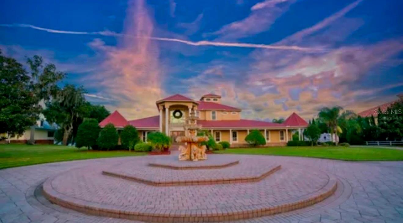 Be the King and Queen of your Tropical Waterfront Estate - This 8+ acre Resort Style Oasis will give you the quality of life you deserve!  Pull in through the private electric gates to this majestic estate.  The 5 Bedrooms and 6 1/2 Baths will keep the family and guests happy in the mainhouse.  There is an additional Detatched In-Laws Quarters/ Guest House with Full Bedroom, Bathroom, Kitchen/LR.  In the main house Large windows open the view of the pool and lakefrontage.  The Heated Salt Water Pool and Spa with fountains wrapped with a luxury pool deck covered in pavers leading to the outdoor kitchen.  Perfect for small or large parties!  There is also a separate guest house that would make a great in-laws quarters. Privacy, distinction, and class!  Live a little!  Lake Thonotosassa is the largest lake in Hillsborough County.

Bring your Boats, Jetskis, ATV's, Cars, Dogs, and Farm Animals.   There is plenty of space for all your toys in the 50x100 4 bay warehouse/shop.  There is also a 4 car adjoining garage for your families daily vehicles. The boat dock has 3 boat slips.  The property is already greenbelt approved giving significant tax advantages!

The property is only 15 minutes from Tampa and i-75, and even closer to I-4.   NO HOA to tell you what you can and cannot do.  Be your own boss!

Seller Financing Considered with 1/2 Down.