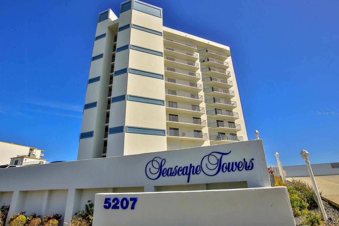 Welcome to your Spacious Oceanfront condo directly on the shores of New Smyrna Beach. You will have room for the entire family in your large 3 bedroom 2 bath condo with extended living area and breath taking views of the vibrant Atlantic Ocean. Plenty of room for guests to come stay the weekend as this unit comfortably sleeps 8. Your living room and dining room offer panoramic views of the ocean and the gorgeous sunsets over the famous estuaries here in NSB.  Your nicely appointed kitchen has plenty of storage as well as stainless steel appliances and a wet bar, separate pantry space as well as breakfast bar. You will love the views and as you relax outdoors at your new condo with 3 spacious balconies.  New Hurricane Rated rated sliders lead to the patios off of your master bedroom, guest bedroom and living areas. Your master bedroom has a completely renovated master bath with huge walk in shower with a bench and glass door, quartz counter tops with double vanity as well as a walk in closet with custom shelving.  Tile flooring through out and carpet in the bedrooms. Washer and dryer in the unit and AC updated in 2016. Seascpae Towers is one new NSB's best kept buildings with on site management. The complex offers gated entry with atrium and 2 elevators, heated pool and spa, saunas, spacious sundeck, lighted tennis courts, shuffle board, BBQ area and is located on the no-drive portion of the beach. Keep your car safe and secure in the gated underground garage as well as 6x6 locked storage area. Seascape Towers just completed renovation on the exterior of the building including concrete, paint, railings, balconies and more. If you are not here all year, this unit offers great rental income as well.  Schedule your showing today. Isn't it time you started "Living the Dream" in New Smyrna Beach today. ;LocationDescription: Condo ;Water: City