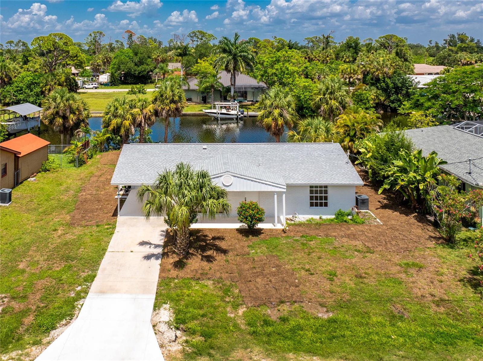 This beautifully renovated two-bedroom, two-bathroom waterfront residence offers the perfect "turnkey" lifestyle for snowbirds or seasonal residents. Featuring direct saltwater canal access to the Gulf of Mexico, a brand-new 392 sq. ft. pool, and extensive modern updates—including a new roof, chef-inspired kitchen, and upgraded bathrooms—this home is designed for effortless Florida living.Property HighlightsWaterfront Lifestyle: Direct saltwater access from your own backyard. Whether you are a boater or simply enjoy the serene waterfront views, this property provides the quintessential Florida coastal experience.Turnkey Modernization: Move in with confidence knowing the home has been completely renovated. Enjoy the peace of mind that comes with a brand-new roof and the luxury of modern, updated finishes throughout.Outdoor Living: The expansive 392 sq. ft. pool serves as the centerpiece of your private outdoor oasis, perfect for cooling off after a day on the water or lounging in the warm Florida sun.Ideal Size: While intimate in scale, the thoughtful 2-bedroom/2-bath layout maximizes efficiency and comfort, making it an ideal "lock-and-leave" property for seasonal residents looking to escape northern winters without the maintenance of a larger estate.Why Southwest Florida?Port Charlotte and the greater Southwest Florida region are perennially ranked among the top destinations in the U.S. for retirees and seasonal residents alike.  Year-Round Climate: Enjoy over 300 days of sunshine annually. Winters in Southwest Florida are legendary, with mild, comfortable temperatures that allow you to trade snow shovels for golf clubs and fishing rods.  The Boater’s Paradise: Port Charlotte is defined by its extensive canal network and proximity to Charlotte Harbor, one of the largest and most pristine estuaries in Florida. With easy access to the Gulf of Mexico, the world-class tarpon fishing of Boca Grande is just a short boat ride away.  Unmatched Lifestyle: The region offers a perfect balance of tranquility and accessibility. You are minutes away from soft, white-sand Gulf beaches, championship-level golf courses, and the nature-filled trails of the Charlotte Harbor Preserve State Park.Convenience & Culture: You aren't just buying a home; you’re buying into a community with a lower cost of living, no state income tax, and proximity to major regional hubs like Sarasota and Fort Myers for world-class shopping, dining, and international airports.A "Slow-Paced" Coastal Gem: Unlike the dense congestion of larger Florida metros, Port Charlotte maintains a more residential, manageable, and relaxed environment—making it the ideal landing spot for those seeking a true change of pace.
