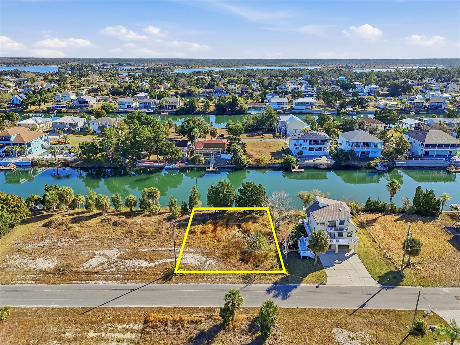 Welcome to Gardenia Dr in Hernando Beach, FL — a buildable lot in a community where life moves a little slower and days are meant to be enjoyed. This is your opportunity to create a home that fits your rhythm, whether that’s a full-time residence, a weekend escape, or a laid-back coastal retreat. Hernando Beach is known for its relaxed vibe and strong sense of community. It’s a true golf cart neighborhood, where neighbors wave as they pass, sunsets are part of the routine, and local restaurants and shops are just minutes away.
When you’re ready to explore, you’re conveniently close to some of the area’s best destinations — Weeki Wachee Springs and Pine Island State Park are nearby for kayaking, swimming, and beach days, while Tampa is easily accessible via the Suncoast Parkway and Orlando via Highway 50 for day trips or weekend getaways. If you’ve been dreaming of coastal living that feels comfortable, connected, and refreshingly unhurried, this lot is a wonderful place to start.