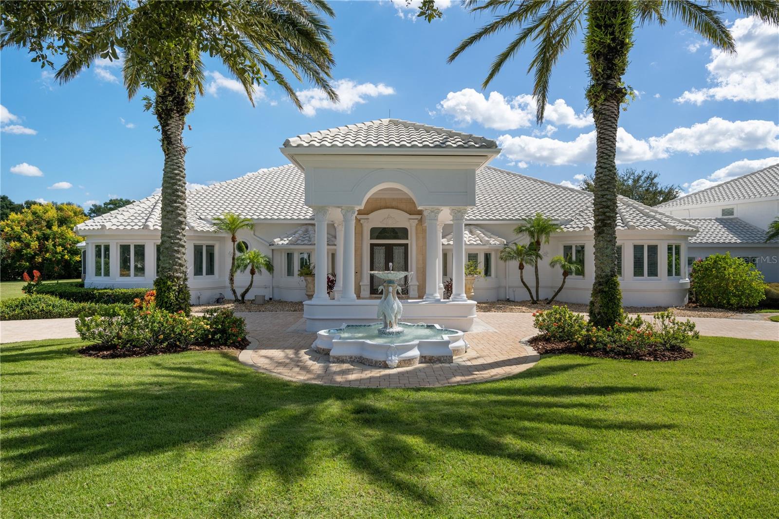 Welcome to this stunning 7-bedroom, 5.5-bathroom estate nestled on a private 2-acre lot in the highly acclaimed Lake Down Crest neighborhood of Windermere. Boasting an impressive 8,461 square feet of luxurious living space, this sprawling residence offers an idyllic retreat for those seeking both privacy and convenience. Step inside and be greeted by a bright and open floor plan that seamlessly blends modern elegance with timeless charm. The spacious bedrooms throughout the home provide ample space for relaxation and rejuvenation, ensuring that everyone in the household can enjoy their own personal haven. The highlight of this magnificent estate is undoubtedly the huge master bedroom suite, a sanctuary of tranquility and comfort, complete with a lavish en-suite bathroom and a walk-in closet that will leave you in awe. There is also a full guest apartment above the garage with living area, bedroom, bath, and a full kitchen, and an elevator. The location of this exceptional property is second to none. Situated just minutes away from local theme parks, fine dining establishments, and world-class shopping destinations, you'll have endless entertainment options at your fingertips. Whether you're seeking thrills at the nearby amusement parks or indulging in a gourmet meal at one of the many acclaimed restaurants, this home offers the perfect balance of serenity and excitement. Outside, the sprawling 2-acre lot provides a picturesque backdrop for outdoor activities and gatherings. Imagine hosting memorable barbecues in the private gazebo, or simply basking in the Florida sun while enjoying the lush greenery and resort style swimming pool with its massive rock waterfall. The possibilities are truly endless. With its unmatched combination of luxury, privacy, and convenience, this home is truly a dream come true. Schedule your private tour today and experience the epitome of Windermere living.