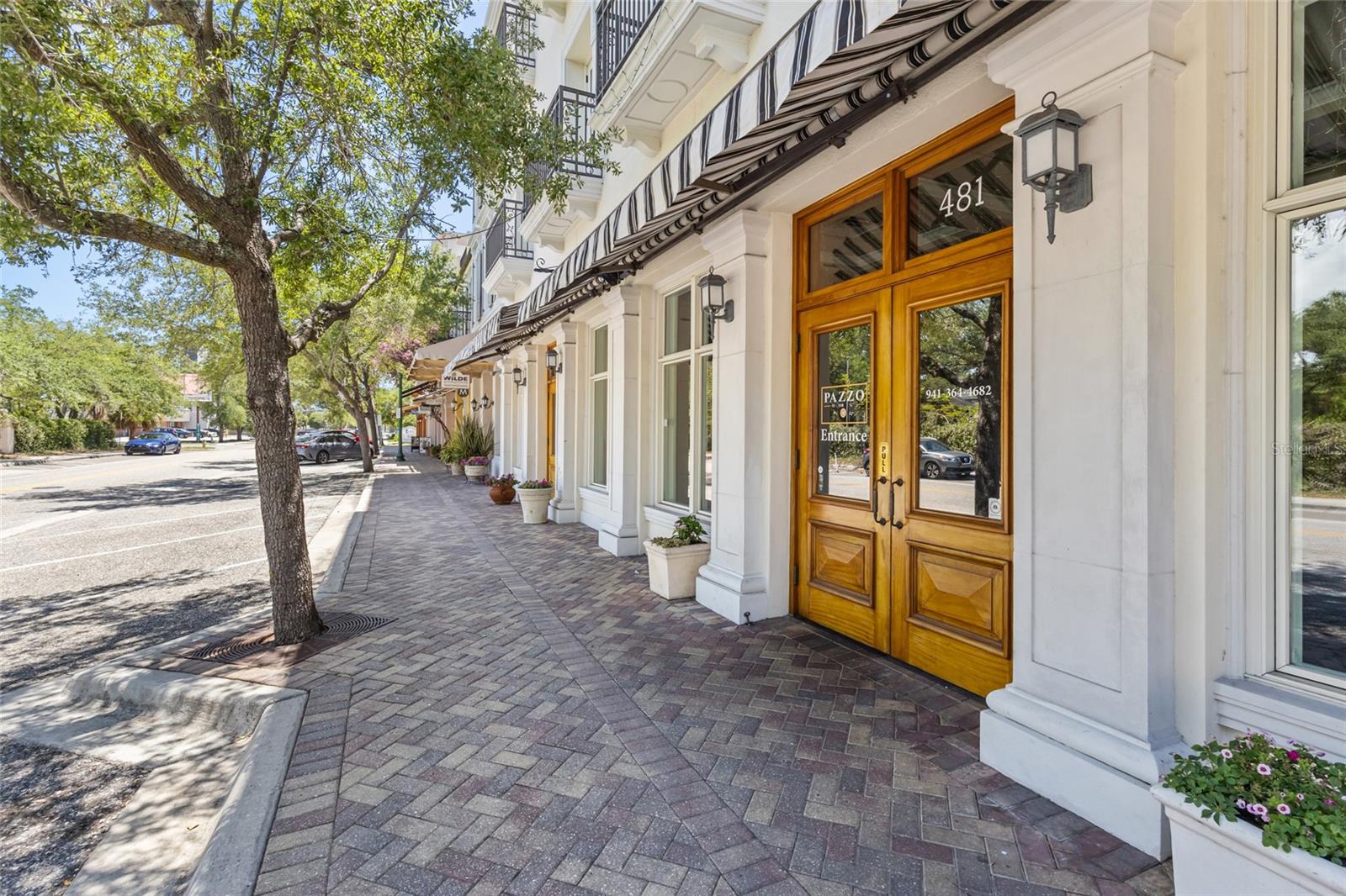Exceptionally reimagined 1-bedroom, 1.5-bath residence in Sarasota’s coveted Rosemary District, delivering a downtown lifestyle where refined design, intentional functionality, and effortless walkability converge. Every single inch of this condo has been thoughtfully built out with precision and purpose, blending charm with elevated design to create a home that lives far larger than its footprint. Soaring 10' ceilings amplify natural light and volume, while light coastal engineered oak floors, leathered marble countertops, timeless sophistication. Luxury upgrades are extensive and cohesive, including Brizo plumbing fixtures, a newly reappointed primary shower, new vanities and toilets in both the primary bath and powder room, custom plantation-style closet doors, California Closets throughout, custom living-room built-ins, designer lighting, custom drapery, a new stackable washer/dryer, new hot water heater, new AC supply covers, and fresh interior paint, doors, baseboards, and casing. The result is a residence that feels bespoke, intentional, and flawlessly finished—move-in ready for immediate enjoyment. Adding to the home’s exceptional livability are two private balconies—one off the living area and one off the bedroom—perfect for welcoming the fresh Florida bay breeze and extending living space outdoors. These open-air retreats, combined with the soaring ceilings and abundant light, create an airy, expansive feel that makes the home live large and undeniably special—ideal for morning coffee, sunset unwinding, or simply opening the doors to let the coastal air flow through.
Beyond the front door lies one of Sarasota’s most vibrant and evolving cultural corridors. The Rosemary District is celebrated for its artistic energy, chef-driven dining, live music, galleries, and a dynamic events  keep downtown engaged year-round. Moments away are Rosemary & Thyme, Hanami Sushi, Blvd Café, Te Bella, Arts & Central, Station 400, and a mix of cultural pop-ups. Publix & Whole Foods Market nearby. Outdoor enthusiasts and pet lovers will appreciate proximity to Sarasota Bay Park and Marina Jack, offering green spaces, waterfront paths, shaded seating, and easy access for morning jogs, sunset strolls, or relaxed dog walks along the bay. With year-round sunshine and access to open space woven effortlessly into daily life.
For beach lovers, Lido Beach is just 3.64 miles away and easily accessed via the free Sarasota Bay Runner trolley, which runs daily from downtown to Lido Beach and St. Armands Circle. Whether heading to the Gulf’s sugary sand and turquoise waters, boutique shopping, or waterfront dining, the trolley makes car-free coastal living simple and sustainable. While the residence includes one assigned covered parking space, many find that true urban chic living means being able to walk or trolley nearly everywhere.
Frequent travelers will appreciate proximity to SRQ Airport, approximately 8 mi away. Sarasota continues to draw discerning residents seeking year-round sunshine, cultural richness, entrepreneurial opportunity, and a refined coastal lifestyle—key reasons so many are flocking here to live, work, and play. A rare RENOVATED 1-bedroom plus powder room configuration in downtown Sarasota, impeccably styled and ideally positioned for those seeking a lock-and-leave residence, vibrant entertainment, waterfront green spaces, and elevated living in one of Sarasota’s most walkable  neighborhoods (Walk Score 94)