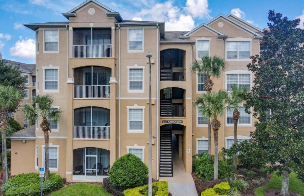 Meticulously maintained and truly turn-key 2-bedroom, 2-bathroom condo in the sought-after, guard-gated Windsor Hills Resort community — just minutes from Walt Disney World, Universal Studios, and all the magic of Central Florida’s theme park corridor! This recently painted unit has been thoughtfully upgraded from top to bottom, making it a fantastic primary residence, vacation getaway, or short-term rental investment. The fully equipped kitchen boasts crisp white cabinetry with gold hardware, granite countertops, a hexagon-tile backsplash, and a dedicated coffee bar, along with a brand-new microwave, newer stove and dishwasher, and kitchenware — everything a chef or guest could need. The open living and dining area features new furniture including a comfortable sleeper sofa, a stylish round dining table, and new light fixtures throughout, all opening to a private balcony. Whimsical, professionally designed themed bedrooms set this home apart: an out-of-this-world Star Wars room with an immersive galaxy mural and matching decor, and a playful Mickey & Minnie-inspired bunk room complete with a fun mural and chalkboard welcome sign — a hit with vacationing families. In-unit laundry adds everyday convenience. Truly turn-key — just bring your suitcase! For buyers seeking a hands-off rental investment, the current management company is available to continue managing the property. Windsor Hills Resort offers resort-style amenities including a lagoon-style pool, water park, clubhouse, fitness center, movie theater, and 24-hour guard-gated security, all within one of Kissimmee’s most popular vacation home communities near Disney. Schedule your private showing today!!!