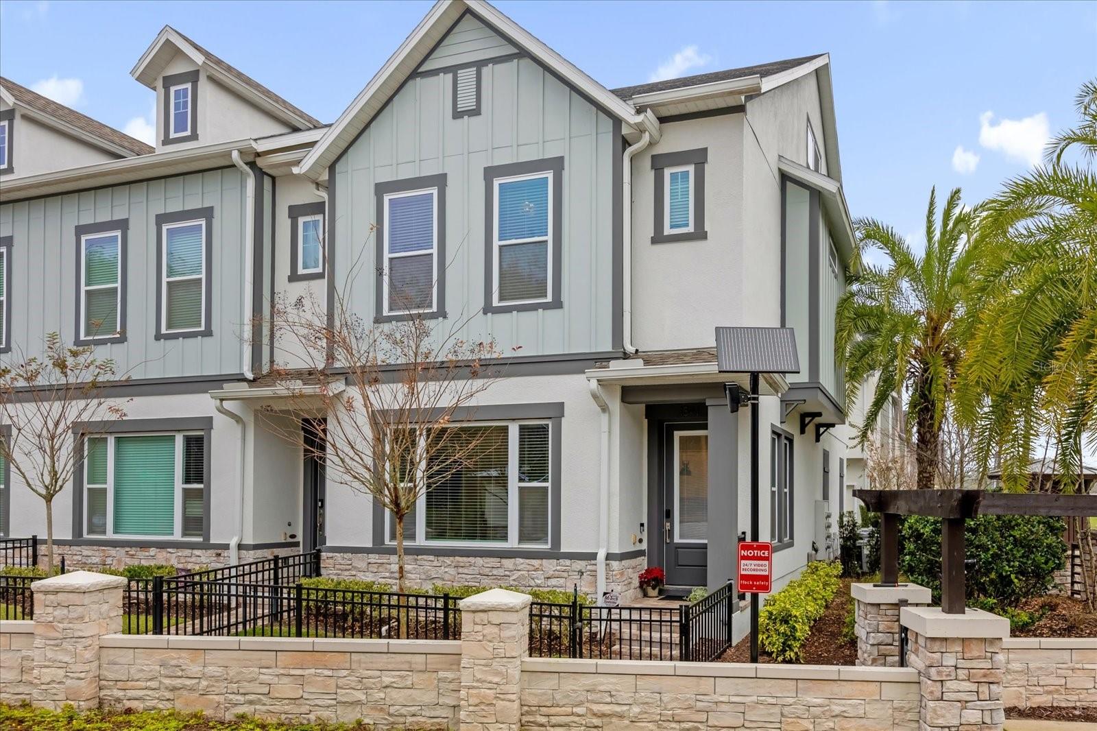 A 2021 David Weekley end unit in gated Griffin Park — newer, upgraded, and priced to move. Corner/end unit with extra light and privacy, fresh luxury vinyl floors, and Restoration Hardware lighting already done for you.

Inside: 10-ft ceilings, an open layout, smart-home features, and a quartz-island kitchen built for everyday life and entertaining. The upstairs primary is private and bright with a custom walk-in closet and dual-vanity bath. Two bedrooms plus a 304 sqft third-floor bonus that works as a true third bedroom, office, media room, or gym.

Steps to Griffin Farms Town Center for dining, coffee, and shopping; minutes to I-4, Heathrow, and the Lake Mary business district. Gated community with a pool and dog park; the $444/mo HOA covers exterior maintenance, so low-maintenance living is built in.