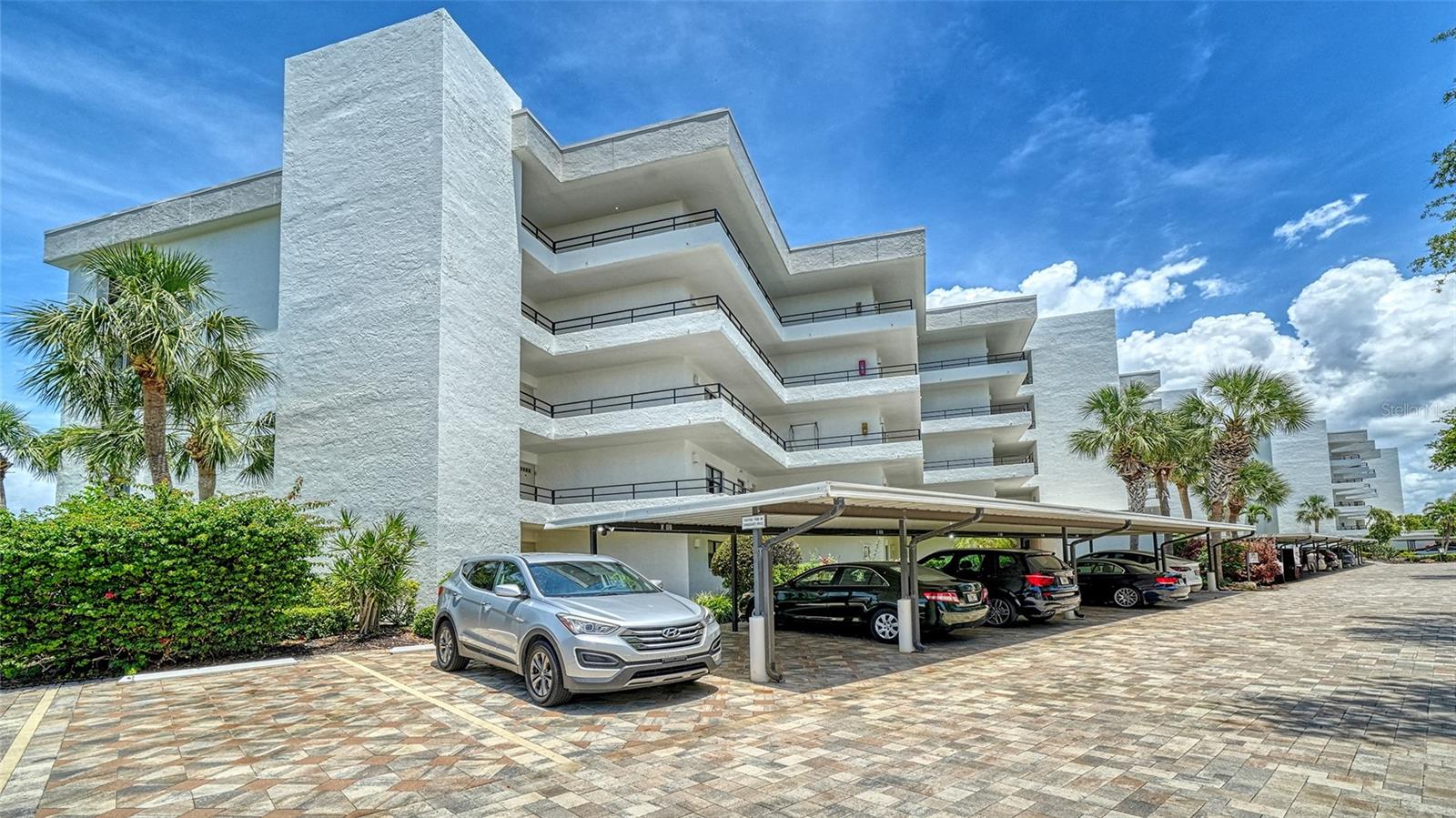 Turnkey Furnished residence at Island Reef with two bedrooms and two baths.  Laundry in residence. Furnished! Carport! island Reef is a serene waterfront community, one of the few gulf to Bay Community that offers many desirable amenities including: Beach, Boat Docks (lifts allowed), Two lit Tennis Courts, Pickleball, 2 Fitness Rooms, Kayak storage, Library, Billiards, Game room, Clubhouse, two Heated Pools, and Gas grills.

PET FRIENDLY!

Tropical Gardens add to the appeal of Island Reef and this wonderful community is close to two of Siesta Key's popular restaurants. Complimentary trolley to Siesta Beach, Siesta Village for dining, shopping, ice cream, mini donuts, cute brunch spots and dancing and live music every night of the week.