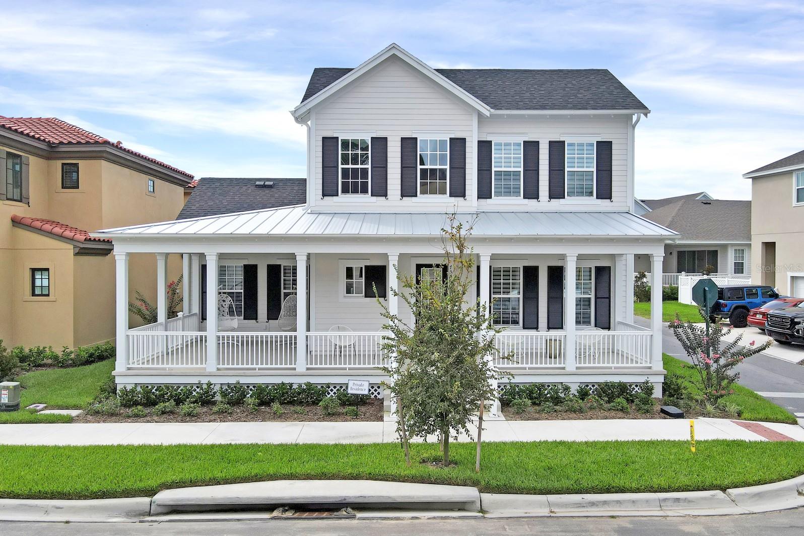 BRAND NEW SINGLE FAMILY HOME. Move in ready! Featuring 5 Bedrooms, 4 Full Bathrooms, and 2 car garage. Located in the newest community of Celebration Island Village at Celebration, Florida. As you start walking toward this awesome home you will be greeted by an oversized nice wrap around porch.  Stepping into the house you will be impressed with it layout, a foyer area, elegant staircase, open floor plan, beautiful tile & wood floors. Gourmet kitchen with custom 42inch cabinets with glass doors on top and crown molding, quartz waterfall island, walk-in pantry with glass door, gas cooktop, tile backsplash with farmhouse sink. High ceiling throughout the home, and an extended relaxing Lanai. The main living space is surrounded with plenty of windows for an illuminated and elegant setting. This home is featuring many upgrades including Custom Blinds throughout entire house and is tastefully decorated. The First Floor features a master bedroom with an elegant in suite bathroom and a huge walking closet that connects into the laundry area. A second bedroom or flex-room with a full-size bathroom. On The Second Floor you will find a spacious loft and game room combo, 3 additional bedrooms, a full bathroom and a Jack & Jill bathroom. This home includes energy efficient features, ceiling speakers, volume control, surround sound package, spot lights, tankless water heater and more. The Open Front Porch and the back Covered Lanai will become your favorites hang out areas to relax and entertain your family and friends. Enjoy the club house and pool area of the community as well as all Celebration Town Center amenities, trails, events, sports, festivals, dining and shopping options. Easy access to schools, including the brand new Island Village Elementary School inside of the community opening August 2023. Easy access to Advent Health at Celebration Hospital, I-4, 417 and Osceola Parkway. Minutes from Disney Parks. Don't wait to see everything this home has to offer. Contact us to schedule a showing today!