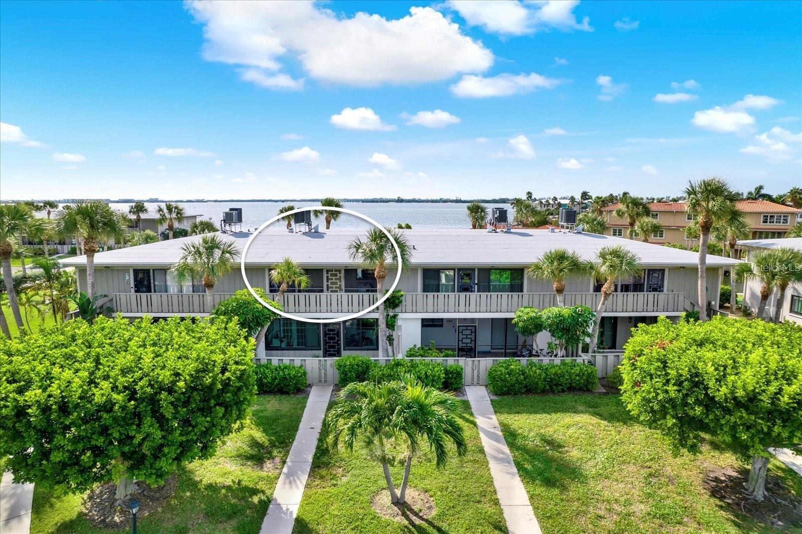 SPECTACULAR WATER VIEWS!!! Welcome to Westbay Point & Moorings, a highly desirable waterfront condominium community tucked away in a quiet area of Holmes Beach on Anna Maria Sound. This charming community offers resort-style amenities including a heated pool and spa, tennis and pickleball courts, and a private beach area perfect for launching kayaks and enjoying the coastal lifestyle. Monthly rentals are permitted up to 12 times per year, offering exceptional flexibility for both personal use and investment.
This second-floor 2B/2B condo is being sold furnished and turnkey, featuring beautiful coastal décor throughout—ready for immediate enjoyment or rental opportunity. BUILDING HAS NEW ROOF IN 2024. 
Recent updates include: Luxury vinyl flooring throughout living areas and bedrooms, Hurricane-impact windows, Brand-new stainless steel appliances (2026),New A/C system (2025). The spacious primary suite opens to breathtaking water views, creating a serene retreat. Additional features include an in-unit laundry closet and pet-friendly policies.
Westbay Point is known for its welcoming, friendly atmosphere where neighbors truly feel like a community. Just around the corner, you’ll find the Holmes Beach public boat ramp as well as public pickleball, basketball, fitness, dog, and skate parks, plus the local library.
Ideally located just a short stroll from Anna Maria Island’s famous sugar-sand beaches, as well as boutique shopping and top-rated dining.
Low HOA fee of $713/month includes:
Cable TV, high speed internet, 2 community pools, escrow reserves, insurance on the building, exterior and grounds maintenance, on-site management, pest control, sewer, trash, and water—everything except electric! FULLY FUNDED RESERVES AND NO OPEN HURRICANE CLAIMS.