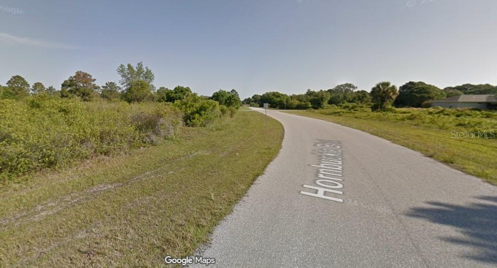 Fantastic opportunity to own an oversized 11,000 sq. ft. (approx. quarter-acre) lot on Hornbuckle Blvd in the rapidly growing city of North Port! Whether you’re an investor looking for a prime location or a homebuyer ready to build your dream home, this spacious parcel offers plenty of room for your vision. Conveniently located near shopping, dining, and everyday amenities, and just minutes from I-75 for easy access to Sarasota, Venice, and the Gulf Coast beaches. North Port is one of the fastest-developing areas in Southwest Florida—secure your piece of this thriving community today!
