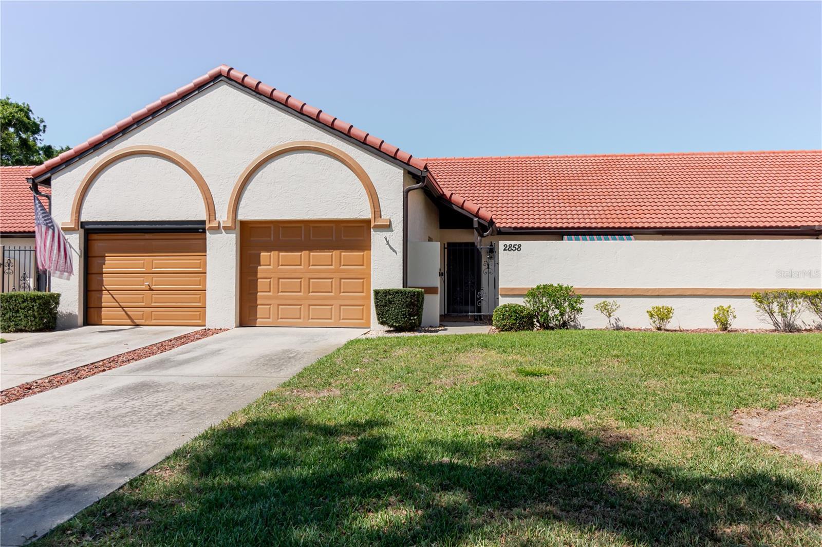 PRICE REDUCTION - Enjoy the relaxed pace of Florida living in the Casa del Lago community of Avon Park. This fully updated 2-bedroom, 2-bath villa is truly move-in ready—ideal for snowbirds, seasonal residents, or anyone looking to downsize without sacrificing comfort or lifestyle. The open-concept living and dining area is bright and welcoming, featuring engineered wood/laminate flooring throughout the bedrooms, living room, kitchen, and dining space, with tile in both bathrooms for easy maintenance. The kitchen includes a breakfast bar with seating for 3–4, perfect for morning coffee or casual meals. The spacious primary bedroom features a walk-in closet and sliding doors opening to a private, enclosed front courtyard—an ideal spot to enjoy quiet mornings or peaceful evenings. A screened rear patio provides an additional outdoor living area with no backyard neighbors, offering serene views of the citrus field. The secondary bathroom features a jetted bathtub, adding a spa-like touch—perfect for relaxing after a day of golf, swimming, or exploring the area. Casa del Lago is a well-maintained community offering amenities designed for active, carefree living, including a community pool, tennis and shuffleboard courts, dock access on Lake Damon, and convenient RV or trailer storage. Golf, fishing, boating, and scenic outdoor recreation are all close by, with River Greens Golf Course just minutes away. Whether you’re searching for a winter retreat, a low-maintenance full-time residence, or a lock-and-leave lifestyle, this updated villa delivers comfort, convenience, and the easygoing Florida living snowbirds love.