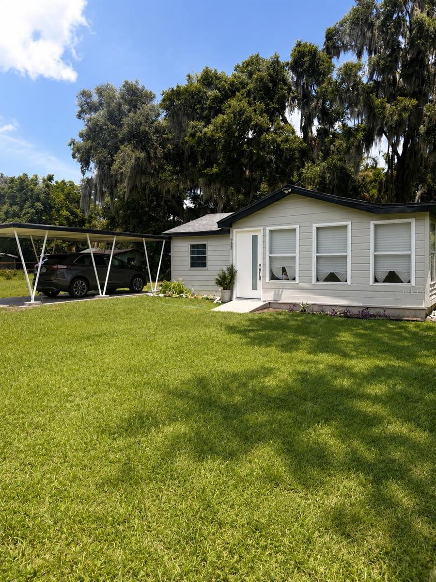 One or more photo(s) has been virtually staged. Move-in ready and fully furnished! This charming 3-bedroom, 1-bath home offers a flexible floor plan, with one room that can easily serve as a third bedroom, home office, nursery, or guest room.
The recently remodeled kitchen features beautiful granite countertops, updated cabinetry, and all appliances included. The bathroom has also been tastefully renovated, providing a fresh and modern feel.
This home is being sold fully furnished and includes all major appliances, plus an additional refrigerator located in the rear storage area for extra convenience and storage.
Enjoy the freedom of no HOA and the convenience of a location close to shopping, dining, outdoor recreation, and easy access to I-75. Whether you're looking for a primary residence, seasonal retreat, or investment opportunity, this property is ready for its next owner.
Includes deeded boat slip with access to Lake Panasoffkee.