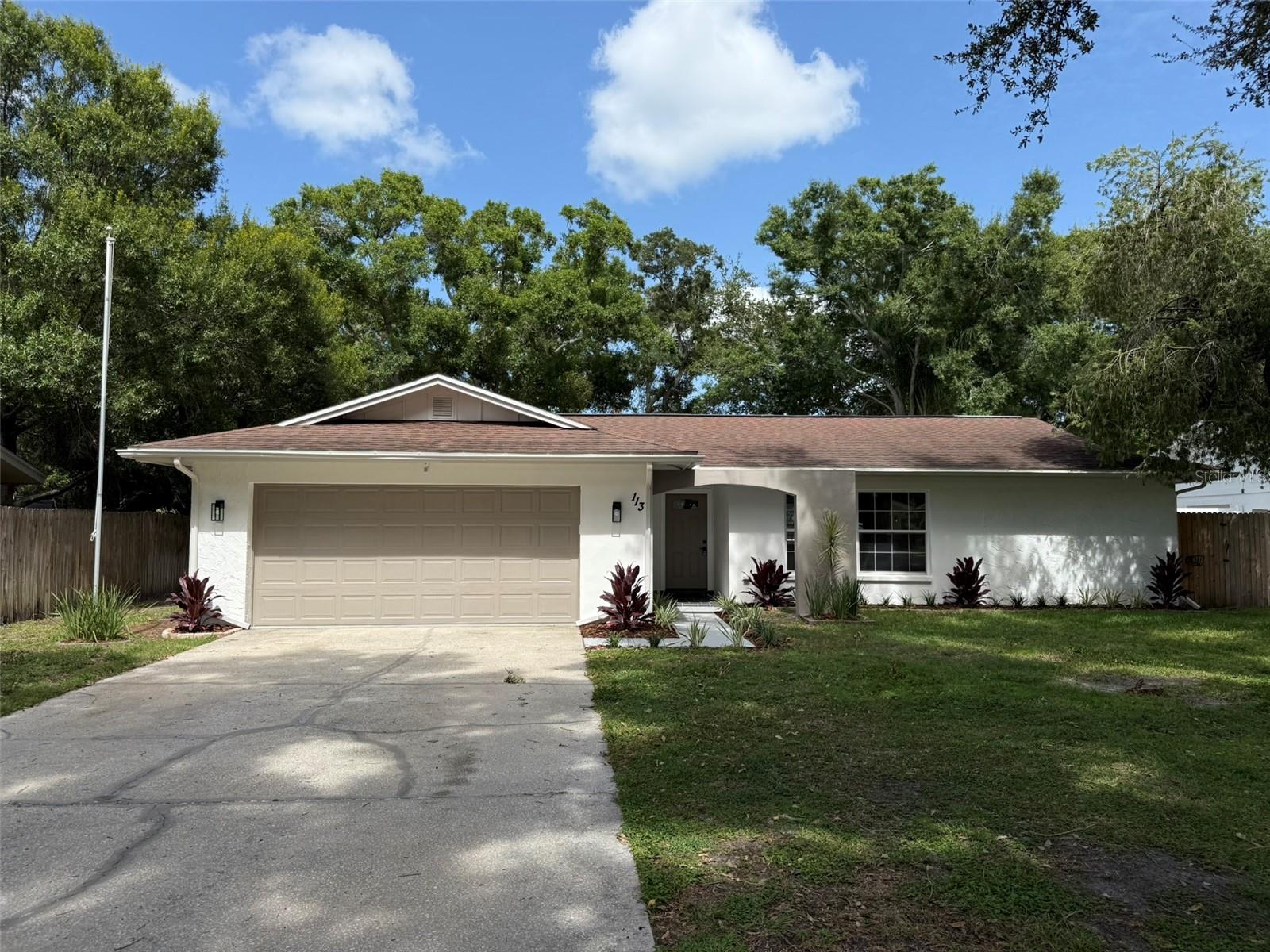 Immaculately renovated 3-bedroom, 2-bathroom home situated on a huge private ¼ acre lot with a beautiful pool and spacious 2-car garage. This charming home features a custom designed brand-new kitchen with all wood cabinets, quartz countertops, and stainless-steel appliances. It also features beautifully renovated bathrooms, brand new luxury oak vinyl flooring, master bedroom with private en-suite bathroom, spacious walk-in closets in each bedroom, and elegant charm throughout the home. This stunningly designed home features an ideal layout, a beautiful atmosphere, and living spaces filled with natural light.
Outside, you have a private backyard oasis with a sparkling pool and an enclosed screen room. Fully fenced backyard provides privacy and space for pets, play, relaxing and entertaining. The outdoor space also features a fireplace and covered sitting area which provides a perfect place to relax year-round. 
Along with the fully custom renovated interior of the home, major improvements also include a new garage door (2025), newer roof, new water heater (2023), and new privacy fence (2025).
From the moment you arrive, you’ll be captivated by the quiet and quaint neighborhood in the heart of Safety Harbor. This charming home is located only a few minute drive to downtown Safety Harbor and the beautiful Philippe Park with waterfront walking paths along Tampa Bay. 
A fantastic opportunity for buyers seeking a beautifully renovated home in an exceptional location. Schedule your private showing today!