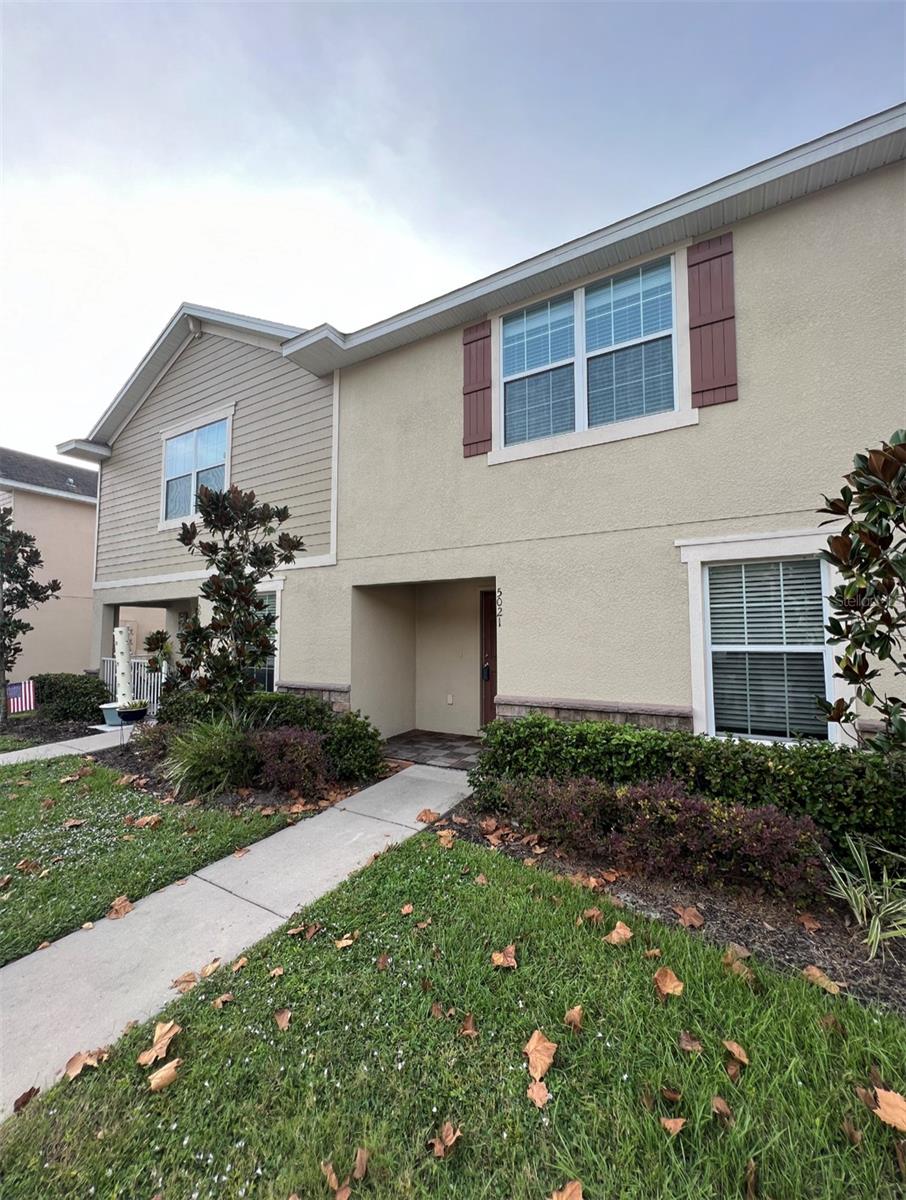 Experience the pinnacle of comfort and style in this impeccable four-bedroom, three-bathroom townhome nestled within the gated community of Sante Fe at Westbrooke in Wesley Chapel. Enter a world of spacious elegance through a grand entryway into an open-concept haven adorned with sleek laminate and ceramic flooring, gracefully extending through every corner, including the elegant staircase - a home free from carpets! Convenience meets luxury with a downstairs bedroom and full bathroom, providing unmatched ease. Indulge your culinary aspirations in the upgraded kitchen featuring lavish granite countertops, 42" cabinets, and a suite of stainless steel appliances dancing harmoniously. Upstairs, a tranquil master retreat, along with two additional bedrooms and full baths, awaits in serene harmony. A dedicated laundry haven with a washer and dryer, coupled with a capacious hallway, ensures personal space for all. Enjoy the convenience and tranquility of a covered and screened lanai for the nice weather! Delight in the community's alluring pool, and escape beneath the covered screen lanai to relish the breathtaking panorama of lush green expanses and the enticing community pool. Perfectly positioned, revel in the convenience of superior schools, surrounded by an array of dining and shopping options like the famous Krates, with effortless access to I-75, Tampa Premium Outlets, and the Shops at Wiregrass – your gateway to exploration. Schedule your showing today!