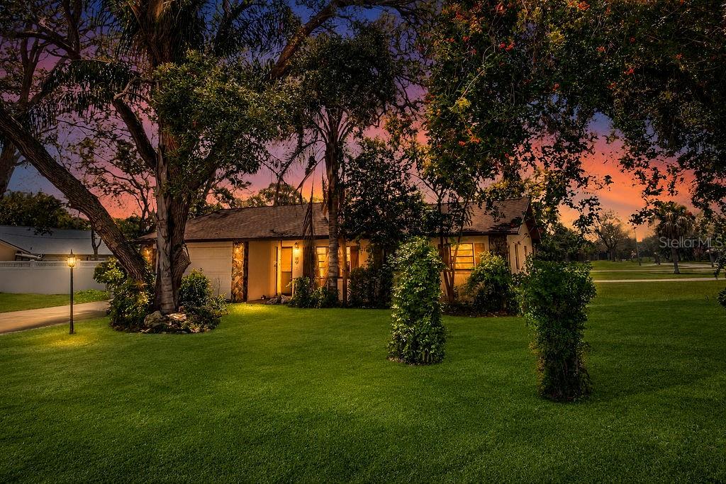 Welcome to this charming 3-bedroom, 2-bathroom home situated on a spacious .28-acre corner lot in an established Spring Hill neighborhood. Offering 1,180 square feet of comfortable living space, the home features a welcoming living area with fireplace, a separate dining area and a functional layout. Step outside to the screened lanai an ideal spot for morning coffee, relaxing or enjoying Florida’s year-round sunshine. Additional highlights include a two-car attached garage, public water, private septic and a roof replaced in 2016. Conveniently located near shopping, dining, medical facilities and everyday necessities, with easy access to Spring Hill Drive and US-19. Outdoor recreation is also nearby, including Weeki Wachee Springs State Park, the Weeki Wachee River, Pine Island Beach and the Nature Coast Botanical Gardens. Come discover the space, convenience and potential this Spring Hill home has to offer!