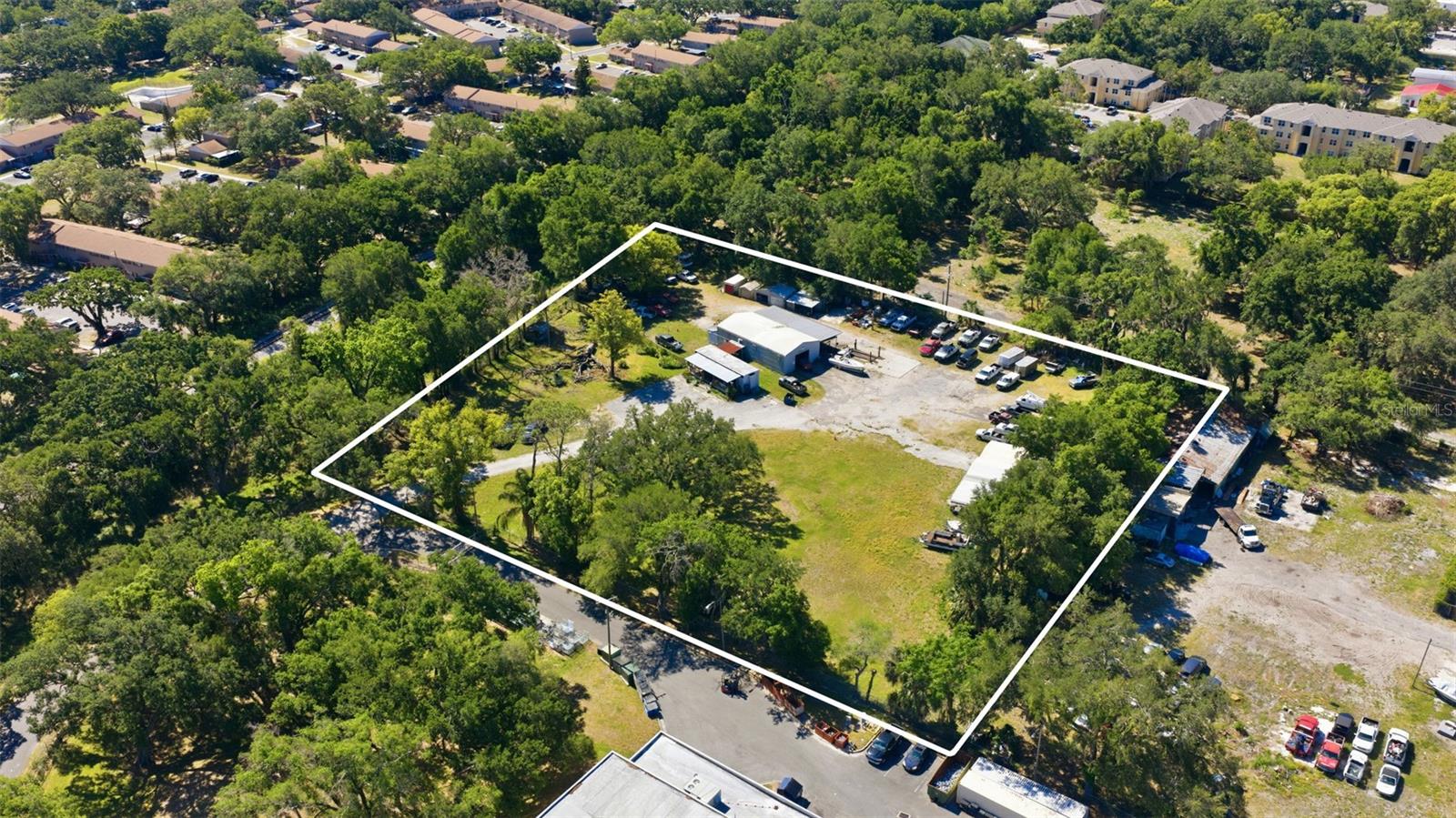 The property consists of a 2.77-acre parcel in Hillsborough County fronting E. Sligh Avenue. It is zoned CI (Commercial Intensive) and allows outdoor storage, warehousing, and light industrial operations without rezoning. The site is approximately five miles from downtown Tampa, near the I-275 and I-4 interchange, and within close reach of Tampa International Airport. The surrounding area includes multiple industrial service and storage uses.
Unlock an exceptional land opportunity at 2415 E. Sligh Avenue in Tampa, Florida. This 2.77-acre parcel offers the flexibility of CI zoning—Hillsborough County’s most comprehensive commercial designation—allowing outdoor storage, warehousing, fleet operations, and contractor use without rezoning.
Exceptional location near E. Sligh Avenue with direct routes to I-275 and I-4. Strong industrial land fundamentals in one of the fastest-growing U.S. metro areas.
Approximately five miles from Downtown Tampa and minutes to Tampa International Airport.
The property delivers powerful logistical advantages with immediate connectivity to I-275, I-4, and downtown Tampa. It sits within a rapidly tightening industrial submarket in the Tampa Bay MSA, one of the nation’s most dynamic growth regions, making it ideal for developers, IOS users, and land-bank investors seeking long-term value.