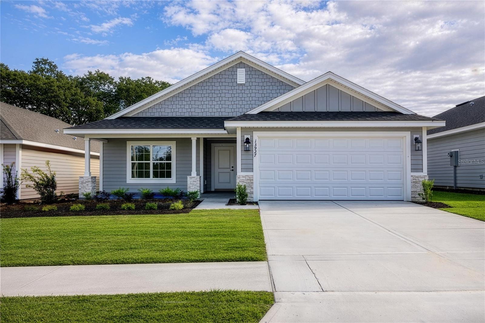 Under Construction. Welcome to Country Way South Phase 2 by Adams Homes in the growing community of Newberry! The popular 1970 floor plan offers approximately 1,970 square feet of thoughtfully designed living space with 3 bedrooms, 2 bathrooms, and a spacious 2-car garage. This open-concept home is designed for both everyday living and entertaining, featuring a spacious great room that flows seamlessly into the dining area and chef-inspired kitchen.

The kitchen is beautifully appointed with granite or quartz countertops (per plan and stage of construction), solid Shaker-style cabinetry, stainless steel Frigidaire appliances, a large center island, pantry, and abundant cabinet and counter space. Quality finishes throughout include luxury vinyl plank flooring in the main living and wet areas, energy-efficient LED lighting, and Adams Homes' renowned craftsmanship.

The split-bedroom layout provides added privacy, with the spacious owner's suite featuring a large walk-in closet, dual vanities with granite or quartz countertops, and a generously sized walk-in shower. Additional highlights include durable Hardie® siding with stacked stone accents, a covered front porch, covered rear lanai, energy-efficient double-pane Low-E windows, a TAEXX® built-in pest defense system, and a fully sodded and landscaped yard.

Enjoy the charm of country living while remaining just minutes from shopping, dining, schools, and an easy commute to Gainesville.

This home has just been framed with an estimated completion in approximately 4 months. Buyers may still have the opportunity to personalize select interior and exterior color selections depending on the stage of construction.

Builder incentives available! Qualified buyers financing through one of Adams Homes' preferred lenders may receive up to $20,000 toward closing costs and/or prepaid expenses on qualifying homes. Secure your new home with only a $1,000 earnest money deposit.

Visit our beautifully decorated model home at 25205 SW 15th Avenue, Newberry, FL 32669 to tour available floor plans and learn more about current builder incentives. Photos are of a similar home and may differ from the completed home. Pricing, specifications, incentives, and availability are subject to change without notice.