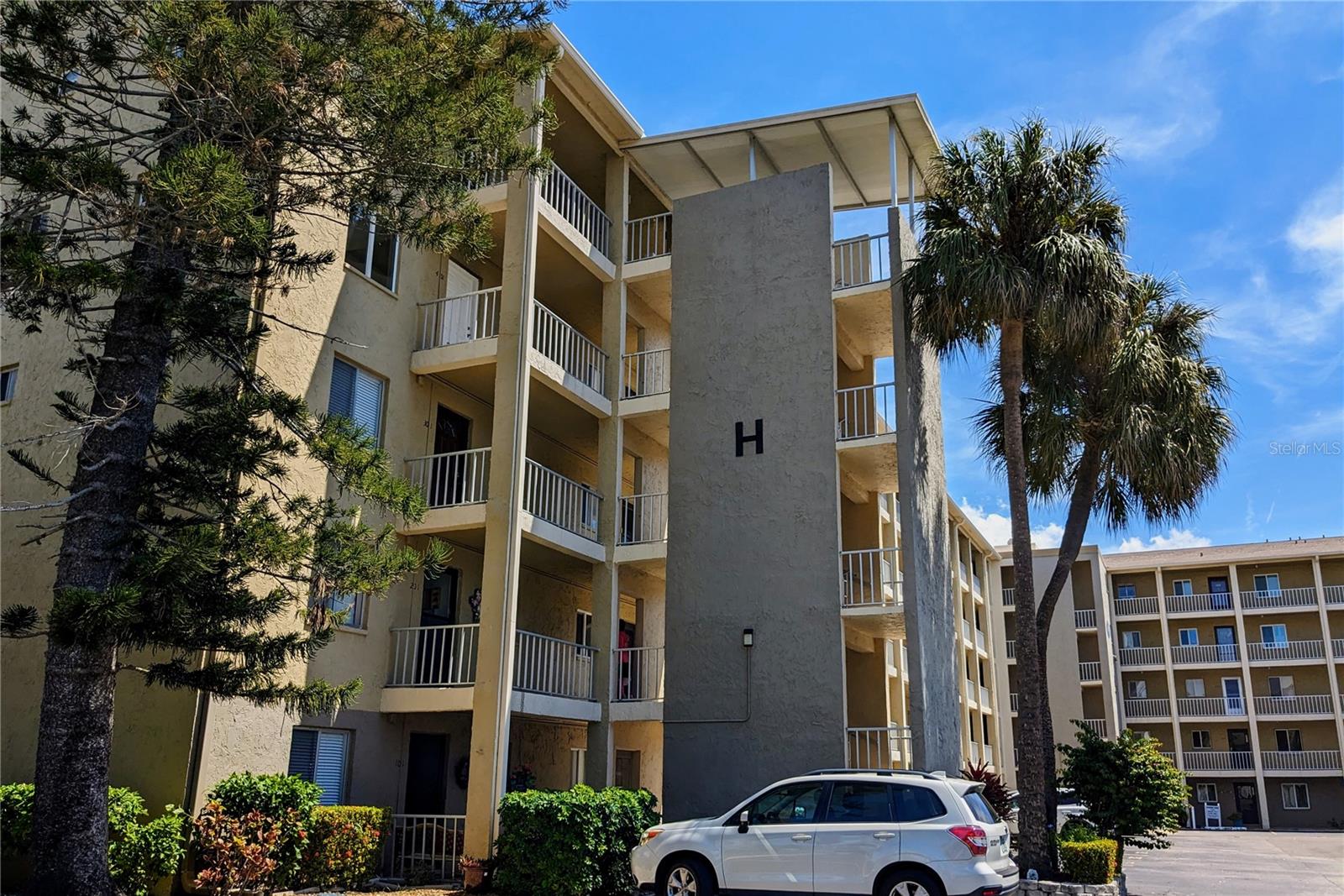 Experience Affordable Lakeside living with a luxury feel in this Turnkey Furnished, 4th floor, End Unit 2BR/2BA condo. Bright, airy rooms and a smart, comfortable layout set the tone, while the fully updated kitchen adds modern appeal and everyday convenience.  Updates & fine upgrades throughout, like attractive Plantation Shutters on all windows. Step onto the private screened lanai and prepare to be wowed—your backdrop is a serene lake panorama that makes this home truly special. Whether relaxing indoors or taking in the tranquil views outside, this well-priced condo delivers lifestyle and value without compromise.  The community offers a full slate of amenities, including a clubhouse with planned activities, heated pool/spa, shuffleboard, and gas grills—perfect for meeting new friends and staying active. And when you’re ready for a day at the shore, the powder-soft Gulf beaches of Anna Maria Island are just minutes away, surrounded by great local eateries and coastal charm.  Commuting or exploring is easy with convenient access to Sarasota, Tampa, and St. Petersburg.   Move right in and enjoy turnkey lakefront living—see this beauty before it’s gone! Priced to sell.