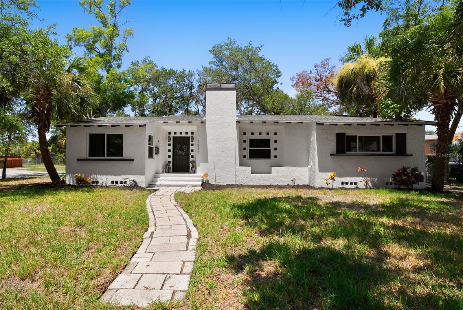 Welcome to 2235 5th St S, where timeless historic charm meets the comfort, efficiency, and peace of mind of a modern home. This is a rare opportunity to own a beautifully restored historic property that offers all the character and craftsmanship buyers love, combined with the confidence of knowing the major systems have already been updated.

Nearly every major component has been upgraded, including the HVAC, plumbing, electrical, newer roof, windows, and spray foam insulation, allowing you to enjoy the beauty of a historic home without the typical concerns of outdated systems.

From the moment you step inside, you'll be captivated by the dramatic 16-foot ceilings, abundant natural light, and the seamless blend of original architectural details with thoughtfully selected modern finishes. Every renovation was completed with care to preserve the home's unique character while creating a truly move-in-ready living experience.

Situated on a spacious corner lot, the property offers an inviting backyard perfect for entertaining family and friends, weekend gatherings, or simply relaxing in your own private outdoor retreat.

A rare and highly desirable feature is the combination of an attached garage and a detached second garage, offering exceptional flexibility for additional parking, storage, workshop space, or hobbies. The detached garage also offers exciting potential for conversion into a mother-in-law suite or ADU, creating opportunities for multigenerational living, guest accommodations, or future rental income.

Historic homes with this level of renovation are exceptionally rare. Offering soaring 16-foot ceilings, timeless architecture, extensive system upgrades, a large corner lot, multiple garage spaces, and future expansion potential, this home delivers the best of both worlds—the soul and character of a historic home with the comfort, efficiency, and reliability of a much newer home.

Conveniently located just minutes from vibrant Downtown St. Petersburg, waterfront parks, award-winning restaurants, shopping, museums, hospitals, and the Gulf Coast's world-famous beaches, this one-of-a-kind property offers an exceptional opportunity to own a piece of St. Petersburg history with all the updates today's buyers desire.

If you've been searching for a truly move-in-ready historic home where the major improvements have already been completed, your search ends here. Experience the charm of yesterday with the confidence of today. Schedule your private showing and discover everything this exceptional home has to offer.