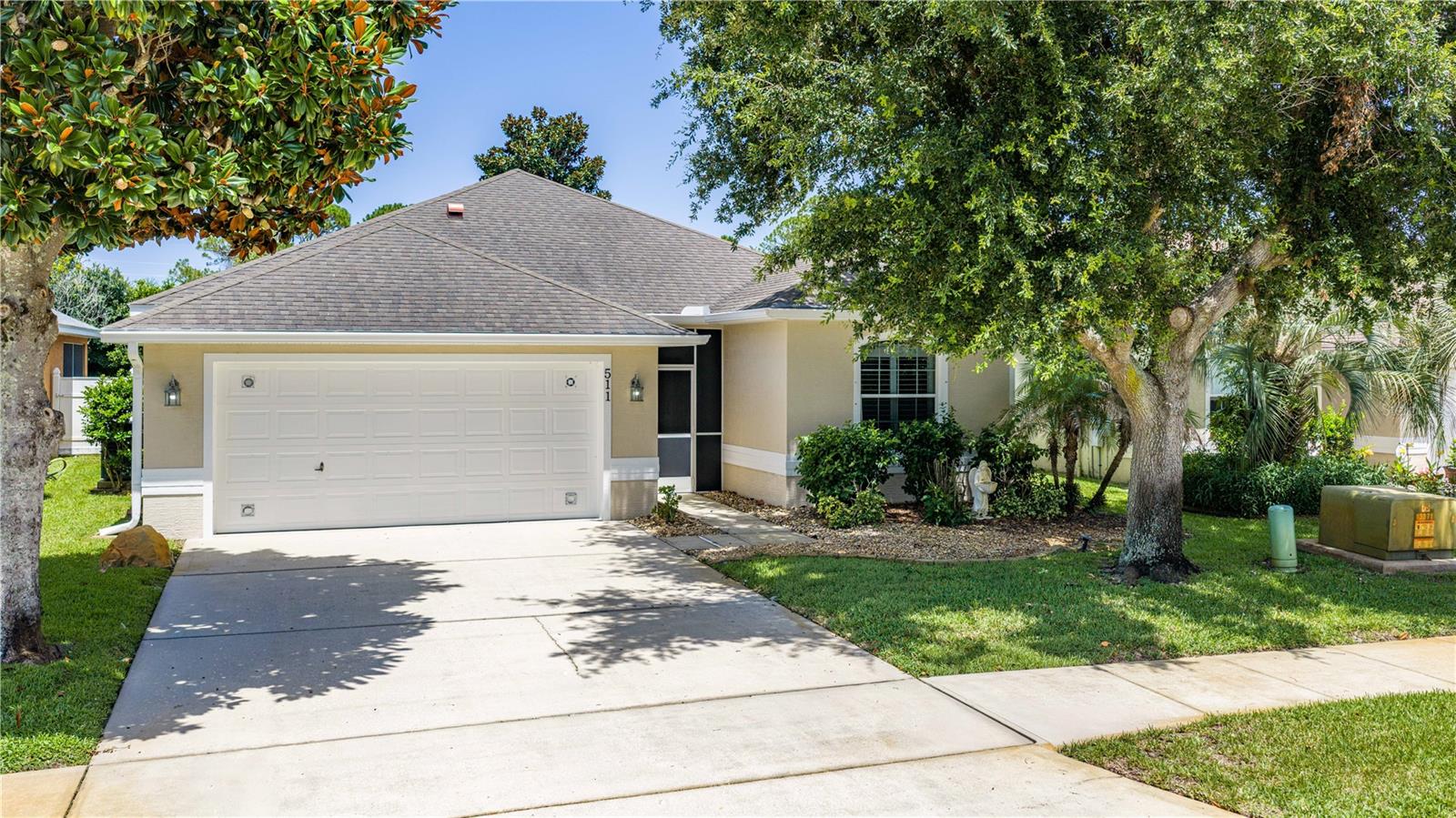 THE ROOF IS BEING REPLACED IN AUGUST 2026! Welcome home to this beautifully maintained concrete block home in the desirable Edgewater Lakes community. Offering 3 bedrooms, 2 bathrooms, and a spacious split-bedroom floor plan, this home is designed for comfortable family living. The open-concept layout features a large eat-in kitchen with granite countertops, a breakfast bar overlooking the expansive great room and dining area, and the added convenience of two full-size refrigerators--perfect for entertaining and large families. The thoughtful split floor plan provides privacy for everyone. Bedrooms 2 and 3 are located on one side of the home with a full guest bath, while the private primary suite is tucked away at the rear. The oversized primary bedroom features a huge walk-in closet and a spacious 10' x 10' en-suite bath complete with double vanities, an enclosed water closet, and a luxurious whirlpool walk-in tub installed in 2016. Step outside to enjoy the screened lanai

overlooking the large, fully fenced backyard with white PVC privacy fencing. There's plenty of room to add a swimming pool, and the electric retractable awning provides additional shade for year-round outdoor enjoyment.

Additional features include ceiling fans throughout much of the home, a freshly painted exterior, and a brand-new roof scheduled for installation in August 2026, providing added value and peace of mind for the new owner.

Don't miss this exceptional opportunity to own a move-in-ready home in one of Edgewater's most sought-after neighborhoods.
