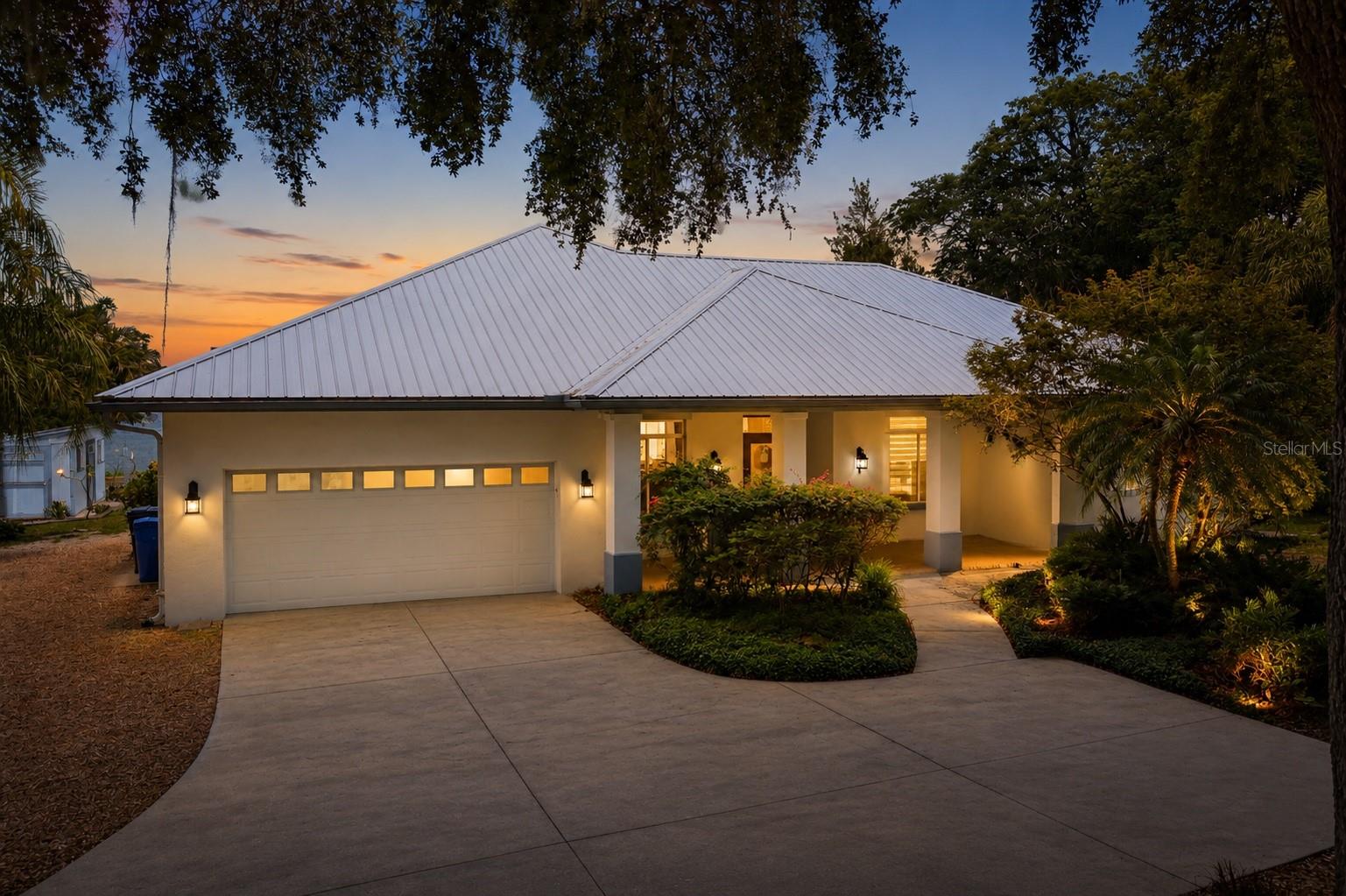 Wake up to sunrise over the water and end your day watching sunsets dance across one of Odessa's most coveted ski lakes. Welcome to 8701 Lake Calm Lane - a stunning lakefront retreat on a true 115-acre, crystal-clear, spring-fed water ski lake.
This 4-bedroom, 3-bath lakefront home is designed to live around the view. Built in 2001 with a durable metal roof (2020) and Trane A/C system (2022), this home offers peace of mind along with the lifestyle. Soaring 10-foot ceilings and warm hardwood floors flow through the main living areas, where a wood-burning/gas fireplace anchors the family room and quad sliding glass doors throw open to wide, sweeping panoramas of Lake Calm. The kitchen is built for entertaining with a center island, stainless steel appliances, double ovens (one convection), gas cooktop, Bosch dishwasher, and a layout that keeps the cook in the conversation. A formal dining room and a breakfast nook with panoramic lake views (works beautifully as a home office) round out the main living spaces.
Retreat to the primary suite featuring two large walk-in closets, dual vanities, a walk-in shower, and a jetted Jacuzzi tub. Three additional bedrooms - including one with stunning panoramic lake views and another with custom built-in shelving - provide flexible space for family, guests, or a dedicated office.
Step outside and the resort-style backyard steals the show. A screened lanai overlooks the lake - your front-row seat for those legendary Florida sunsets. Beyond the lanai, an oversized composite deck expands the entertaining footprint to the water's edge. Take a dip in the sparkling swimming pool with brand-new (2025) pool surface finish and spillover spa, heated year-round by a Rheem electric heat pump. Gather around the stone lakeside fire pit on cool evenings, then walk a few steps to launch your boat, kayak, or paddleboard from your private shoreline. The 11x17 shed keeps all your lake toys, tools, and gear organized.
Extraordinary privacy - no neighbors to the east or south, and only one to the west. The backyard faces north over open water. A magnificent live oak canopies the driveway, and mature, professionally manicured landscaping wraps the property in seclusion. Additional features include an ADT alarm system and central vacuum.
Lake Calm is the real prize here. This 115-acre, super-clear, spring-fed ski lake is renowned for some of the most incredible fishing in all of Odessa. Big-mouth bass, bluegill, crappie - drop a line right off your own shoreline and you'll understand why anglers consider Lake Calm a hidden gem. With water this clear, you can see straight to the bottom - perfect for skiing, wakeboarding, tubing, paddleboarding, kayaking, or simply gliding across glass-smooth water at sunrise before the rest of the world wakes up.
Location, location, location. This is one of Odessa's most coveted addresses - moments from the Veterans Expressway for quick commutes to Tampa International Airport, downtown Tampa, and the award-winning Gulf beaches. Premier shopping and dining at the Tampa Premium Outlets, Citrus Park Mall, and the Westchase corridor are all just minutes away. Top-rated schools, championship golf at TPC Tampa Bay, and the Suncoast Trail are right around the corner.
Homes on Lake Calm are rarely available - and homes with this combination of lakefront lifestyle, privacy, and location are even rarer. Schedule your private tour today and start living the lake life you've always dreamed of.