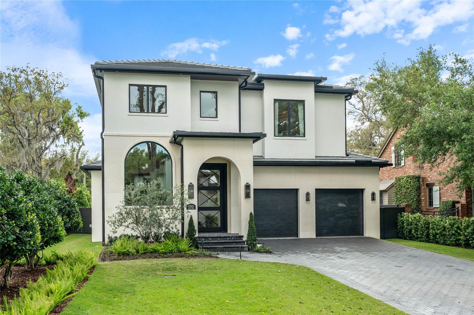 JUST COMPLETED....WINTER PARK / LAKE SUE DISTRICT — A TRUE STANDOUT IN TODAY’S LUXURY NEW CONSTRUCTION MARKET
Proudly presented by RARE Builders, a name synonymous with design-forward custom homes that continue to help set and raise the standard in Orlando and Winter Park, this newly completed residence represents a rare opportunity to secure a fully realized custom home in one of the area’s most sought-after neighborhoods.
Positioned just steps from Lake Chelton and Lake Sue, and located within a highly desirable Winter Park school district, the setting delivers an exceptional lifestyle in one of Central Florida’s most dynamic and tightly held areas.
While new construction inventory exists in today’s market, this home stands apart offering a fresh, cutting-edge architectural vision brought to life through exceptional planning, material selection, and execution. Prominently sited on an elevated homesite with a striking front elevation, the home offers 4,500 square feet of living space, including nearly 3,000 square feet on the ground level alone... a rare and highly functional configuration.
The layout is both expansive and intentional, featuring multiple large living spaces, a private ground-floor primary suite, and a well-appointed guest suite/study/flex space. Upstairs, each bedroom is thoughtfully designed with either an en-suite bath or direct access to a full bath, delivering both comfort and privacy throughout.
The defining feature of this home...and one rarely seen in the market... is the massive Renlita Floataway door system, which opens an entire wall of the home to seamlessly connect the interior Florida room with the resort-style outdoor living environment. This creates a true four-season entertaining space, transforming the way the home lives and offering a level of indoor-outdoor integration that is both dramatic and highly functional.
The outdoor setting is designed as a private resort, complete with a pool, spa, fire and water features, pergola, and summer kitchen... all curated to complement the home’s architectural vision.
Inside, the level of finish and design is exceptional. From breathtaking Venetian plaster walls to a dramatic two-story foyer, the home is defined by a refined and highly curated selection of materials, fixtures, and hardware. Every element has been intentionally sourced and executed, resulting in a level of craftsmanship and aesthetic cohesion that is rarely achieved and immediately recognized by discerning buyers.
A well-appointed kitchen with walk-in butler’s pantry and thoughtfully designed secondary spaces further enhance both function and livability. Integrated Control4 home automation, audio, and security systems complete the offering.
Located just minutes from Downtown Orlando, Winter Park, Park Avenue, Winter Park Village, AdventHealth, and Orlando Health, this home delivers a rare combination of location, design, and execution at the highest level.
This is not simply new construction, it is a distinct, design-driven custom residence offering a level of detail, presence, and livability that is truly rare in the current Winter Park market.