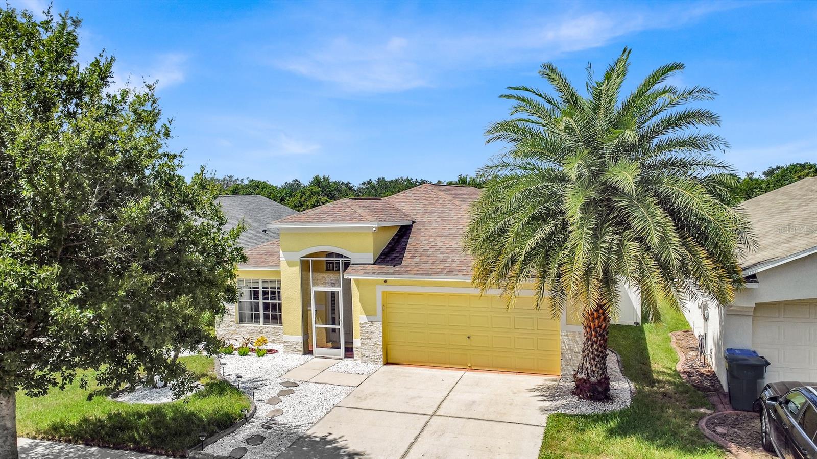 This Meticulously Maintained POOL Home Is Tucked Away In The Peaceful Community Of Covewood. Beginning with the lush landscaping with gorgeous mature palm trees you will immediately feel the tropical vibe! This beautiful home features 4 bedrooms and 2 full bathrooms - both with double vanities • NO CARPET! • high ceilings • newer stainless steel appliances • large laundry room with cabinets • bright open floor plan • oversized pantry with barn doors • Ring Doorbell  • Keyless entry • private backyard oasis with amazing sunset views • NO CDD! • ROOF 2016! • AC 2023! • POOL PUMP 2022! Wake up to coffee on the lanai listening to all the wildlife or wind down after a long day floating on a raft in your private pool! Located approximately 25 minutes to Downtown Tampa, 5 minutes to I-75, 15 minutes to Brandon, so many shops and restaurants within a couple of miles, This home is truly a must see!