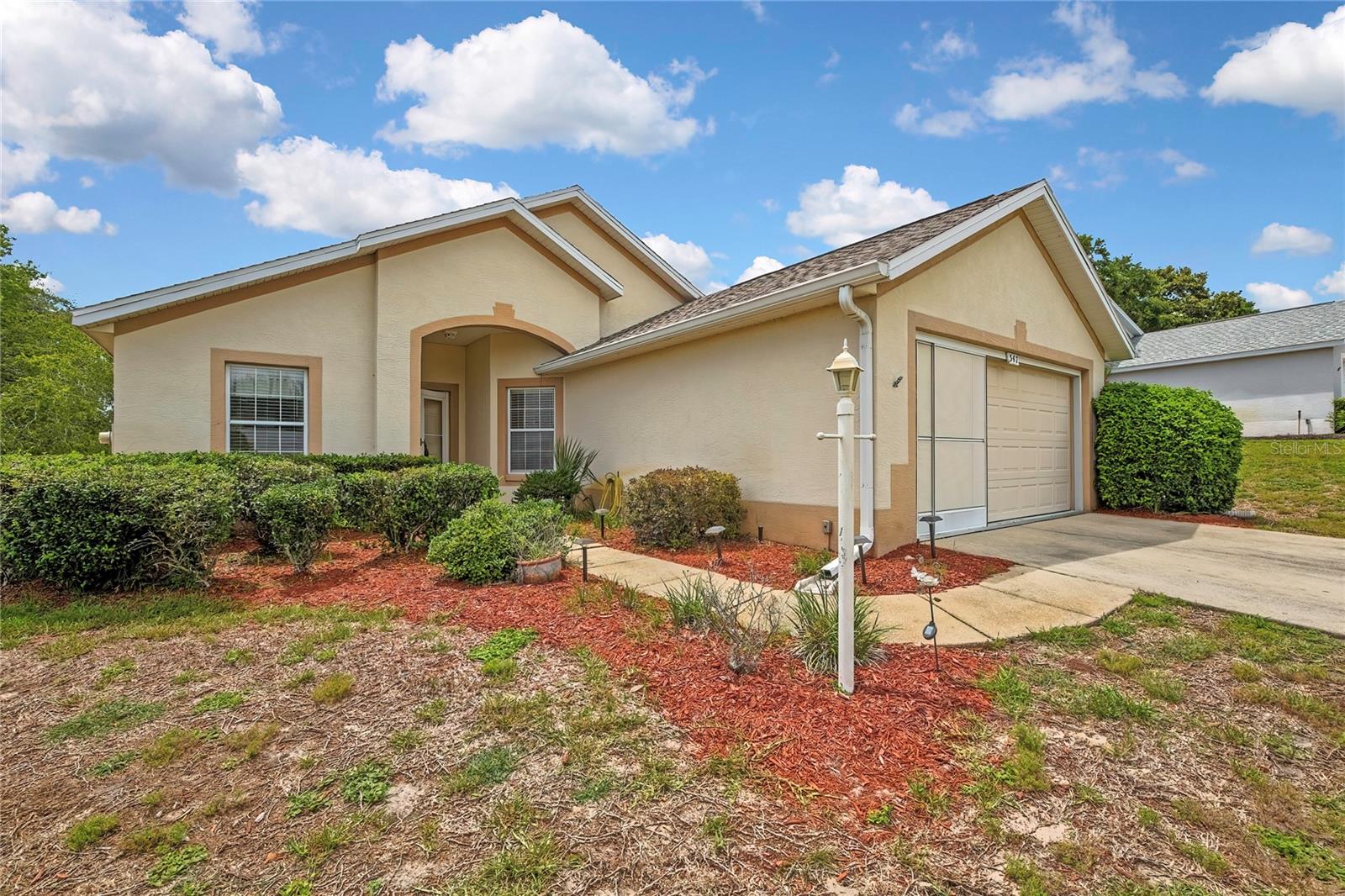 Enjoy easy Florida living in Laurel Ridge! Situated on the 1st fairway of the Twisted Oaks Golf Course, this open and bright 2-bedroom, 2-bath home with an office and 2-car garage offers comfort, functionality, and beautiful golf course views. The spacious kitchen is filled with natural light and features granite countertops, making it a welcoming space for cooking, gathering, and entertaining. Relax and unwind on the enclosed screen porch overlooking the fairway with your morning coffee or on those quiet evenings. The garage features a sliding screen door, allowing for fresh air and added flexibility while working. Major updates include a new roof in 2023 and new AC in 2022, offering peace of mind for the next owner. Laurel Ridge is known for its friendly neighborhood feel, low HOA fees which include fiber optic internet, underground utilities, a community pool, and clubhouse. Conveniently located near golf, shopping, dining, parks, pickleball courts, and access to some of Florida’s best fishing. This home captures the relaxed Nature Coast lifestyle that so many come here to enjoy.