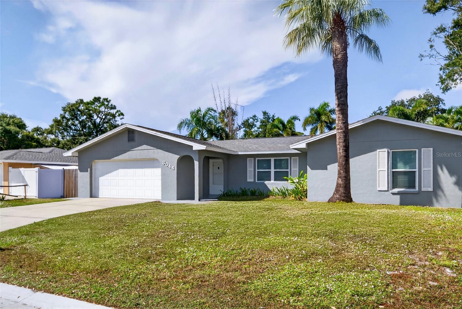 Annual lease — FULLY FURNISHED & TURNKEY, just bring your suitcase! This beautifully renovated 4-bedroom, 2-bath POOL home sits on a quiet street in central Sarasota Springs with NO HOA. Inside, a bright open layout welcomes you with an updated island kitchen, modern appliances, and stylish tile flooring, all paired with comfortable, move-in-ready furnishings throughout. Step out to your own private screened retreat featuring a heated pool and spa, covered patio, and plenty of room for outdoor dining and lounging, true year-round Florida living. A 2-car garage adds easy parking and storage. Ideally located minutes from Bahia Vista and Beneva, with quick access to downtown Sarasota, UTC shopping, I-75, world-famous beaches, dining, and golf. Pool care is included for effortless living. Don't miss this one — schedule your private showing today!