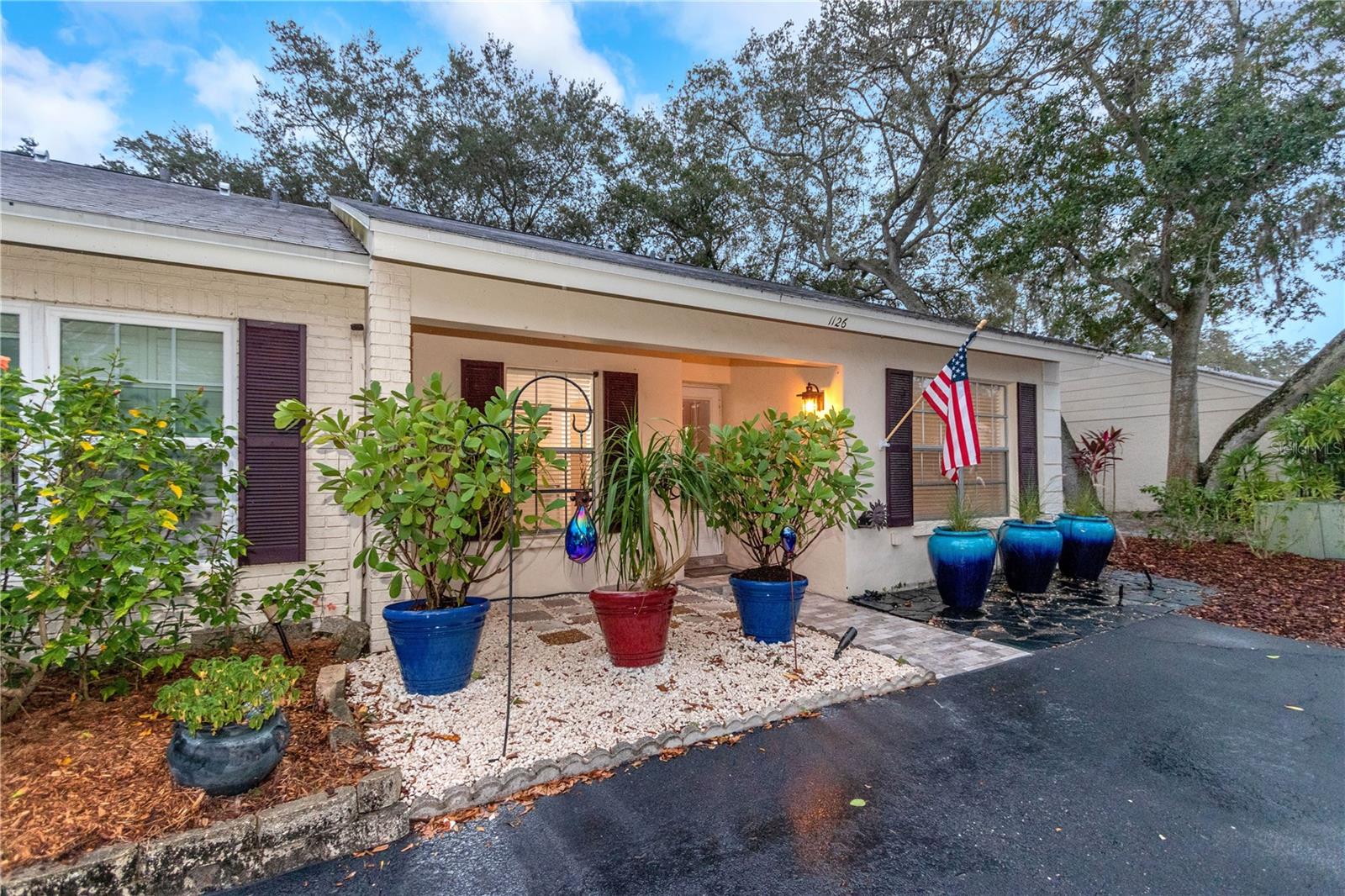 UPDATED and beautiful!  Cathedral ceilings, skylights, light and bright throughout!  Corner property, fenced yard - walk out the gate and one block to the bay and the back entrance to Philippe Park!  Back patio & yard offer privacy and seating area. Florida room overlooks the backyard.  Open front patio and parking for two cars. Front loading washer & dryer. New flooring, lights, ceiling fans, appliances. Community heated pool, cable included. Conveniently located less than one mile to downtown Safety Harbor which is secret little hideaway located on banks of Old Tampa Bay, neighbored by the major cities of Clearwater, Tampa & St. Petersburg. This quaint community has a famous resort, distinctive shops, award winning restaurants, beautiful parks, cultural venues, a variety of holistic businesses, Farmer's Market, Music and Art Festivals, and Third Friday Festivals. Philippe Park is just a few blocks & located on the banks of Old Tampa Bay. It's a fantastic park offering many recreational activities including covered picnic pavilions, walking/biking trail, a boat ramp, playgrounds, ball fields, fishing, & beach area. Safety Harbor City Park is the largest in the County with 21 acres. It has playgrounds, a sand volleyball court, baseball fields, skate park, batting cages, basketball courts, paddleboard rentals. Tampa Airport 16 miles, Clearwater Beach 12 miles.