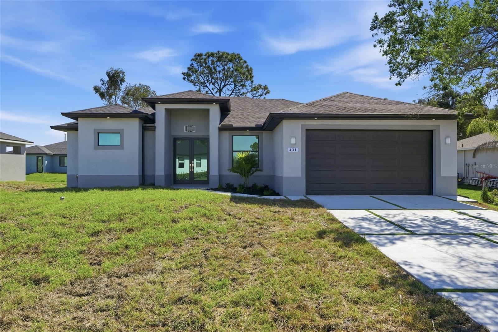 Why are Buyers thrilled with this new construction 3-bedroom plus den, 2-bath home by Smart Homes Constructions offering 1,717 sq. ft. of living area ? The builder with attention to detail partnered with an architect with a keen sense of design. The pair had an intention: All boxes checked and all promises kept to construct an exceptional home. Their open-concept design offers a spacious great room floorplan featuring a chef kitchen possibility. It is a bright functional layout with quartz countertops, stainless steel appliances, contemporary finishes, and excellent visibility into the main living area. Tile flooring, tray ceilings, a shingle roof, and hurricane impact windows add style, durability and storm protection. The flexible den provides useful space for an office, study, media room, or guest-use area. The primary suite includes a spa-style bath with a walk-around shower and separate soaking tub. Enjoy Southwest Florida outdoor living from the covered lanai with outdoor kitchen, ideal for grilling, dining, and relaxing. Additional features include a laundry room and a spacious 2-car garage. And the property is in FEMA Flood Zone X . Work with the builder's lender and we can offer a credit to buyer's closing costs. The builder loves working with realtors in all markets. Realtors love working with this builder as together we can make the buyer's dreams come true.