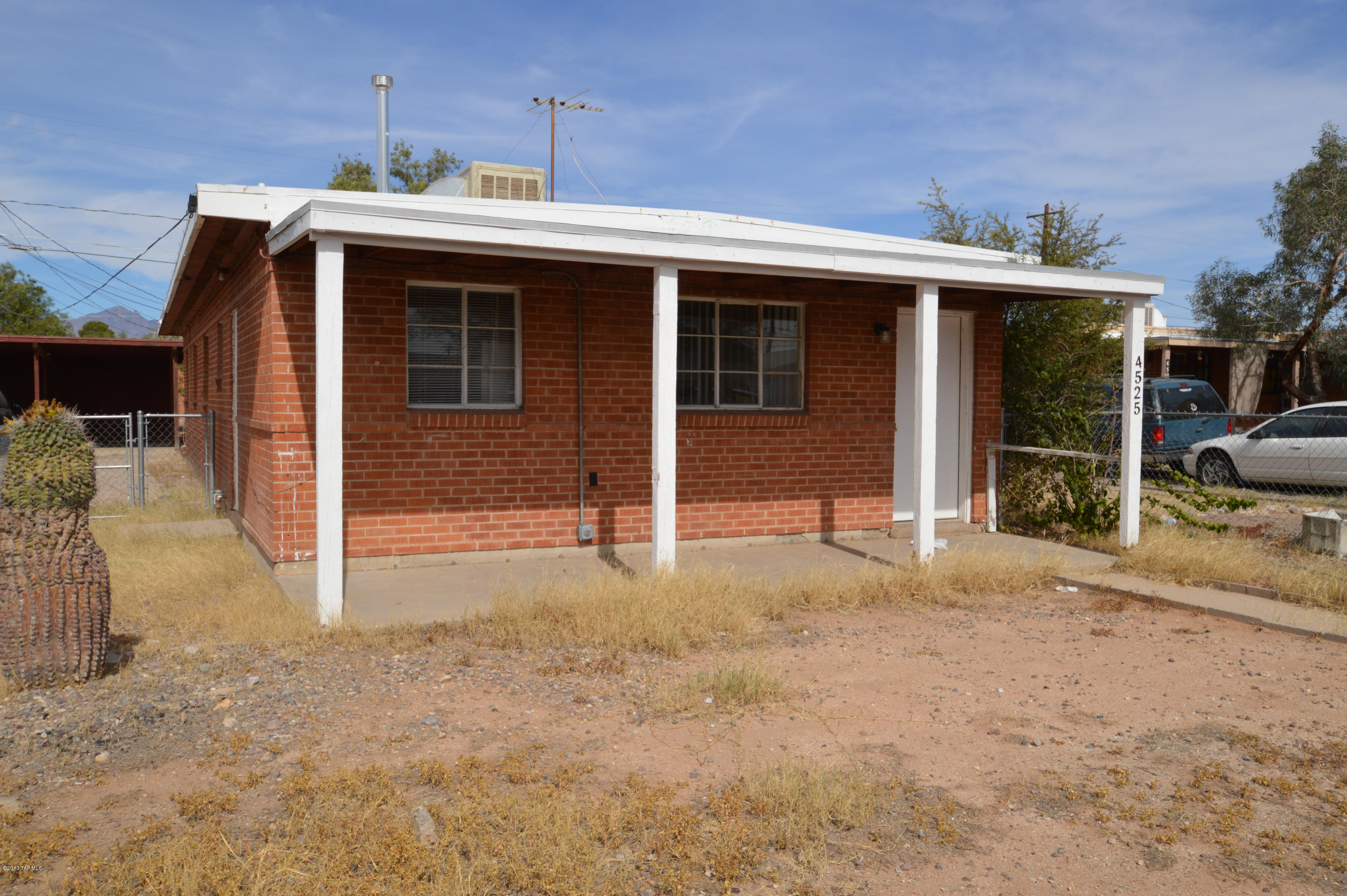 Outstanding value in solid brick 2 bedroom!! Tiled throughout, fresh paint! Spacious living room! Huge covered front porch! Separate carport with additional storage! Great location, easy access to everything. Call NOW, this one wont last long!!
