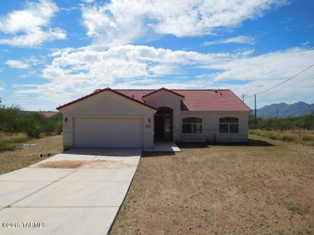 Awesome 3 bedroom/2 bath home located in the Rio Rico Estates subdivision. This beautiful home has arched doorways and large functional kitchen with plenty of cabinets and breakfast bar. Large master suite with dual sinks, roomy walk in closet. Great yard with lots of space and plenty of privacy and spectacular mountain views.