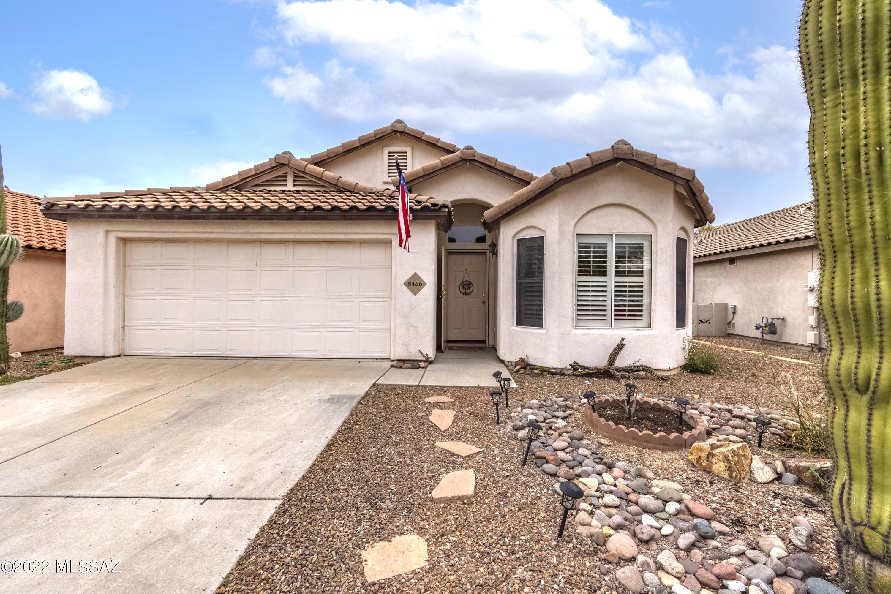 Here lies a beautiful home in the desirable Dove Mountain Community. The home has 1631 sq ft of living space, 3 bedrooms, 2 bathrooms and a large family room with fireplace. The spacious backyard features a covered patio great for entertaining with family and friends. The kitchen's equipped with plenty of cabinet space, stainless steel appliances, breakfast area & a formal dining area. The master bathroom has dual sinks and walk-in closet. This home is located close to I-10, shopping, restaurants and much more!