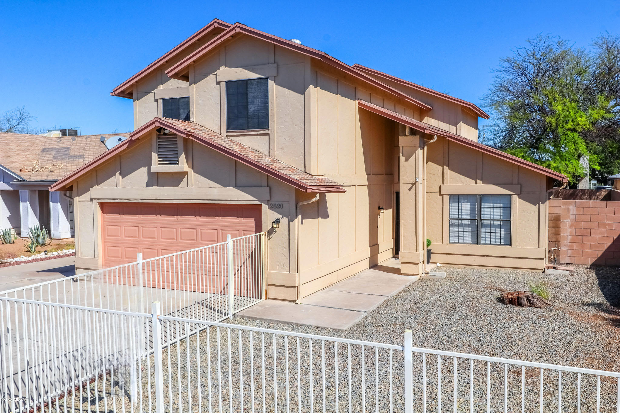 Great move in ready home!  1803 sq.ft, 4bed/2.5bath, with beautiful cathedral ceilings as soon as you walk in, cozy fireplace in living room, beautiful french doors that open to large back yard, EXTENDED 2 car garage with built in storage and utility sink, EXTENDED driveway, large side gate to park your toys in back, fully fenced front yard, wrought iron doors front and back, AND an AMAZING large bay window in Master.  You'll also love that you're only a 5 minute walk to the neighborhood park:)