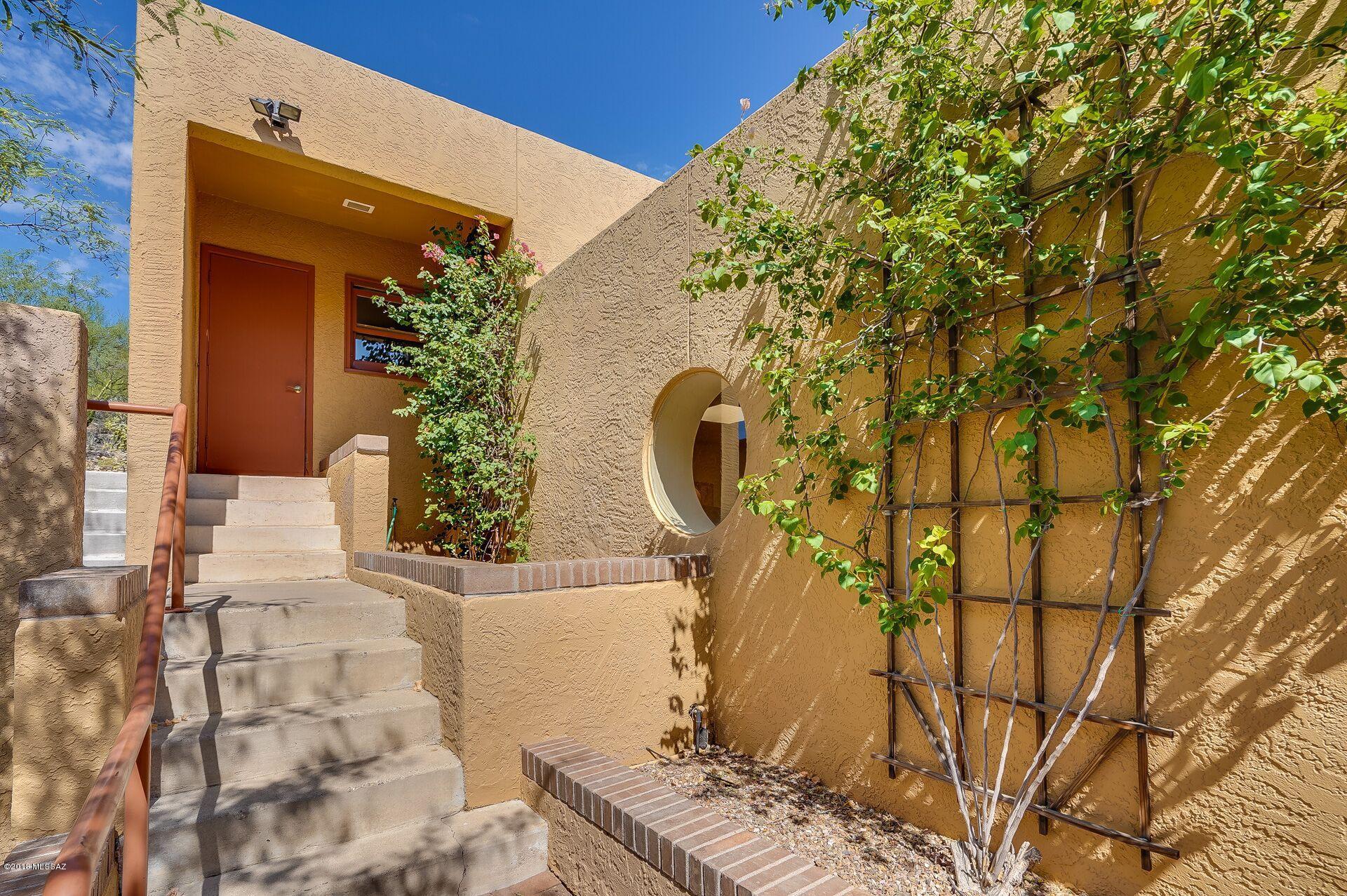 Best Value in Cimarron!!! $80,000 off original list price and $27,000 below 2004 purchase price. Open the door to expansive mountain views! Wonderful Contemporary Family home with split floor plan. Very spacious. Lovely open kitchen with center island. Beautiful master suite with loft and fireplace. Split level with separate kids/guest areas so everyone has there own space. This 4 bedroom plus office/den is  ready for the new buyers. Large Family Room off kitchen plus additional spaces for family time or entertaining. Formal dining room, living room or TV/playroom. Backyard has grass and beautiful fruit trees. Soak in the sparkling pool and take in the beautiful views!