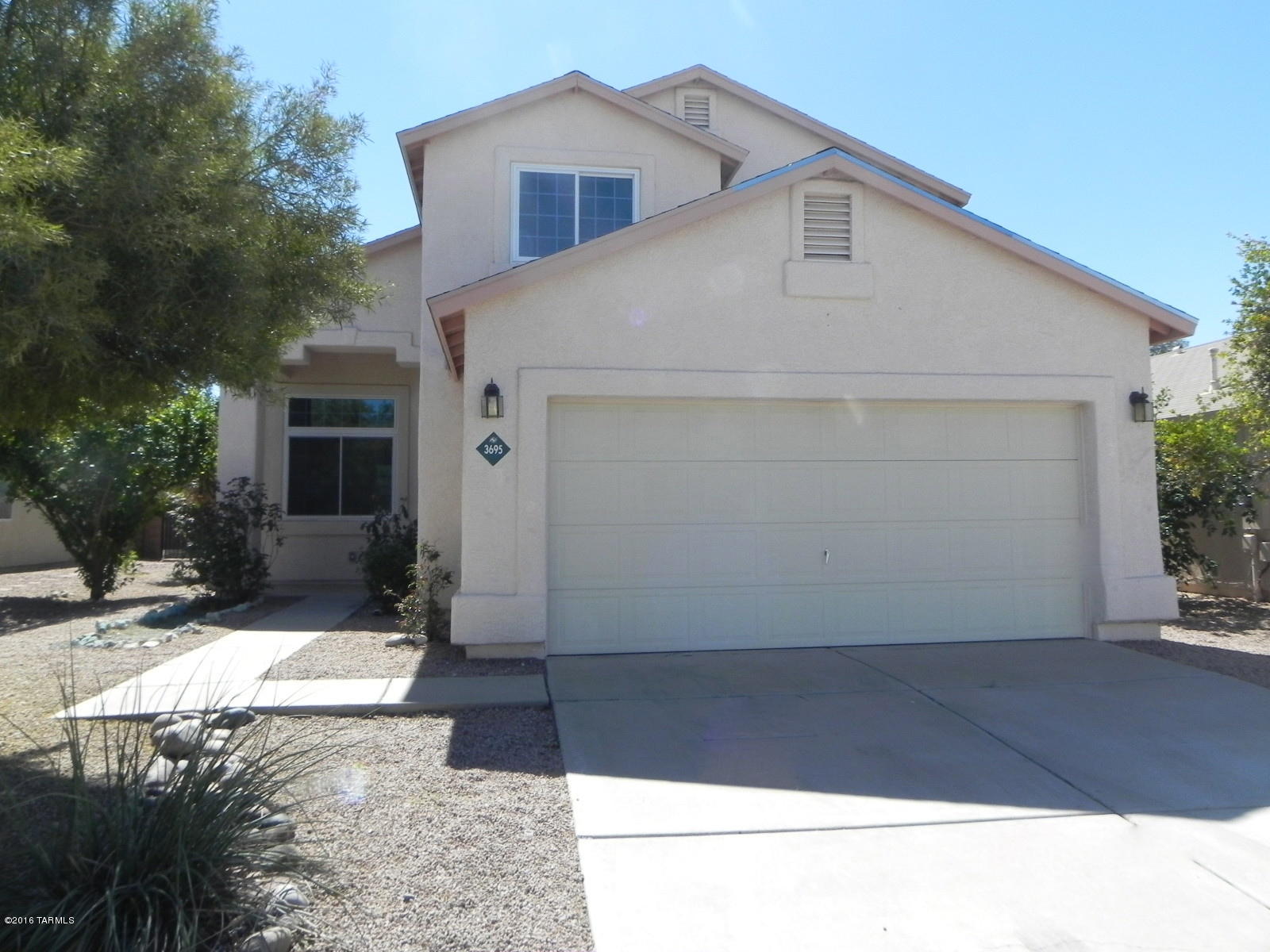 Lovely 3 bedroom, 3 bath home on a large lot. Nice floor plan with spacious bedrooms, bright open kitchen, master bedroom balcony, high ceilings and plenty of natural light.  Interior freshly painted with new carpet installed. Large enclosed backyard is great for entertaining. Close to Pima College, YMCA and minutes from the freeway. Convenient to shopping and schools. Terrific for a growing family. Come see today! This is a Fannie Mae HomePath property. First Time Buyers, complete the HomePath Ready Buyer homeownership course. Attach certificate to offer and request up to 3% closing cost assistance. Ask Agent for more details. Restrictions apply.