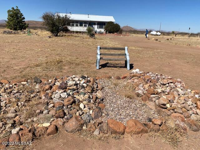 Wonderful home with beautiful views of the Chiricahua Mountains located on 120 acres. 

This home includes a nice Arizona room to enjoy the views,  workshop/shed, and covered carport with room for your equipment or additional vehicle and/or toys.

The well was deepened in 2021.  Additional details available.  Grazing lease can be transferred to new owner to maintain the Agriculture Tax Rate.

Bring your horses and/or farm animals.  Many places you can ride right off of the property.  Close to Sunizona, which includes Sandy's Restaurant and the Mustang Mall, which are well known icons in the area.