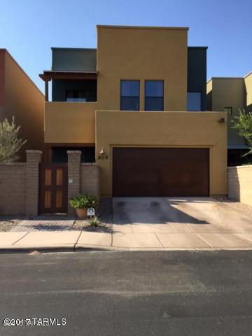 Imagine life in this gorgeous home! Sipping morning coffee on your private balcony over looking the river walk, watching the monsoon storms roll in, having access to the river walk just steps out side your front door, taking a weekend stroll to the local farmers markets. Life may feel like a vacation in this home. You'll love the private gated community which includes a sparkling pool, playground and dog park. This incredible home is 2301 square feet and features granite counters, stainless steel appliances, travertine and wood plank tile, large bedrooms, the master suite is huge with separate sitting or office area and private balcony.