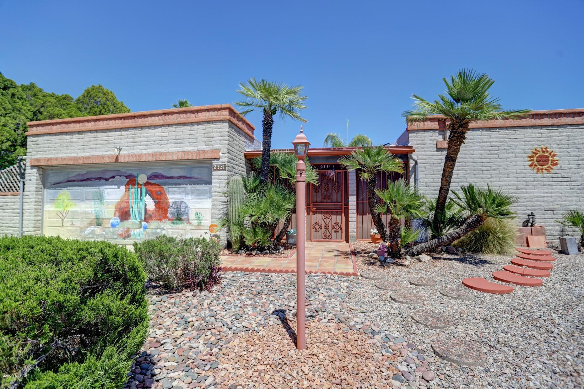 Put on your swim suit, bring out the hot dogs, hamburgers, and your favorite beverage and enjoy this fabulous back yard with pristine pool
and take advantage of Arizona sun!  This four bedroom home in a desirable neighborhood has NO HOA, a large screened in back patio ideal for outdoor dining.  Highly polished sautillo tile extends from the interior of the house  to the patio.  Original paintings by a California artist add interest to the dining room, family room and hallway.  Mission San Xavier del Bac is painted on the block wall in the back yard as well as other Tucson scenes.
This home is in a quiet neighborhood close to Pima College west, within 6 minutes to I-10, close to downtown, and within 20 minutes to the University of Arizona and Banner Medical Center.  See it today!