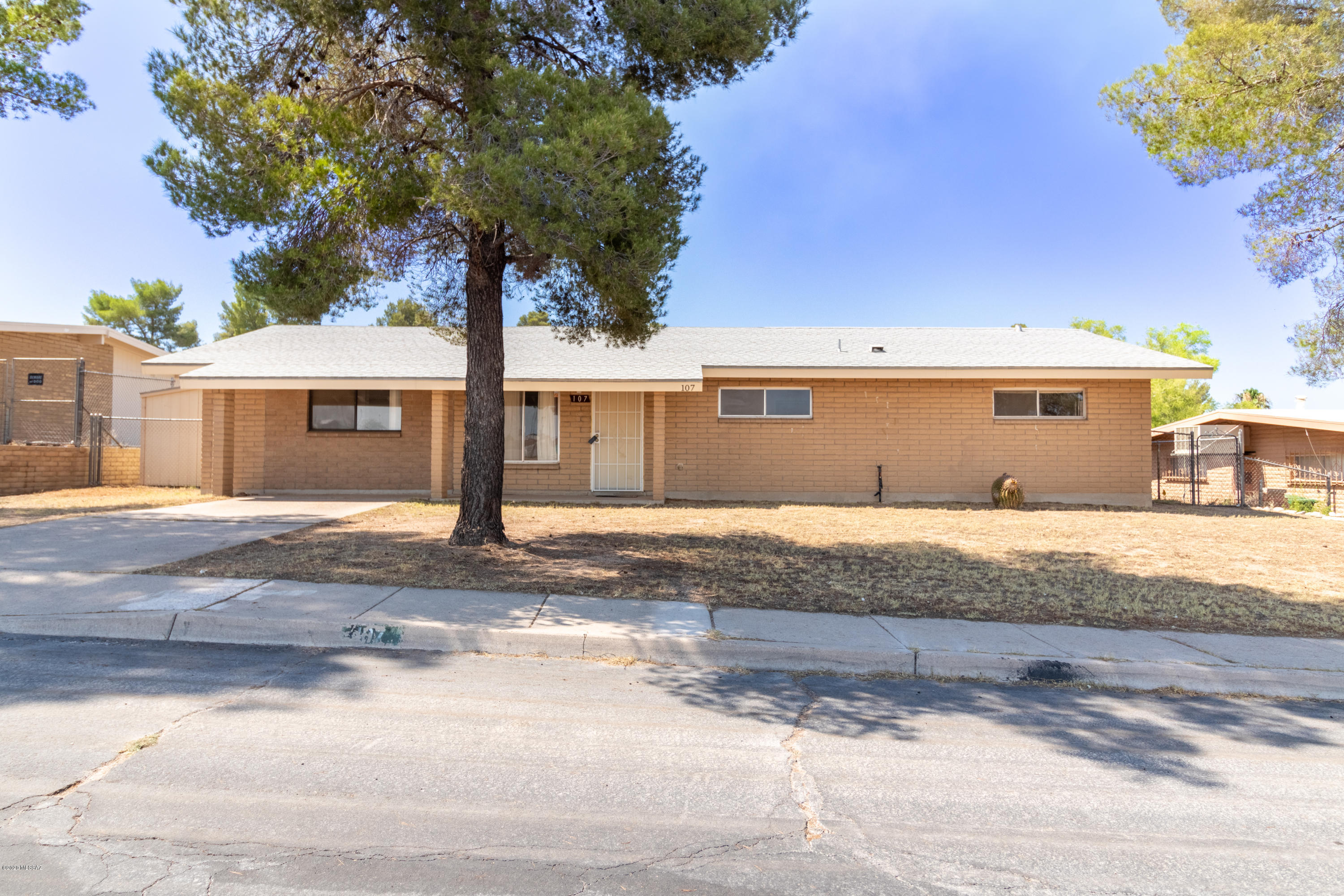 This spacious 3-bed 3-bath home has a great layout and is ready for your personal touches! The interior features an additional family room, indoor laundry hook-ups, and two master bedrooms with separate en-suite bathrooms. The fenced-in backyard features security floodlights, a large covered patio with ceiling fans, and two additional storage sheds. Schedule a showing or virtual tour today!