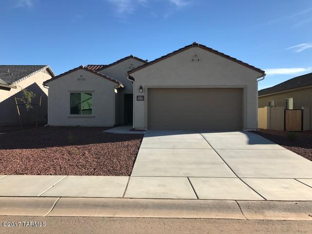 THIS POPULAR HOME DESIGN FITS COZY IN ANYONE'S LIFESTYLE, GREAT OPEN FLOOR PLAN, BEAUTIFUL KITCHEN WITH UPGRADED CABINETS, WITH HUGE GRANITE KITCHEN COUNTERTOPS FOR ENTERTAINING, EXTENDED TILE FLOORING, LOCATED A SHORT DISTANCE TO COMMUNITY AMENITIES MUCH MORE!