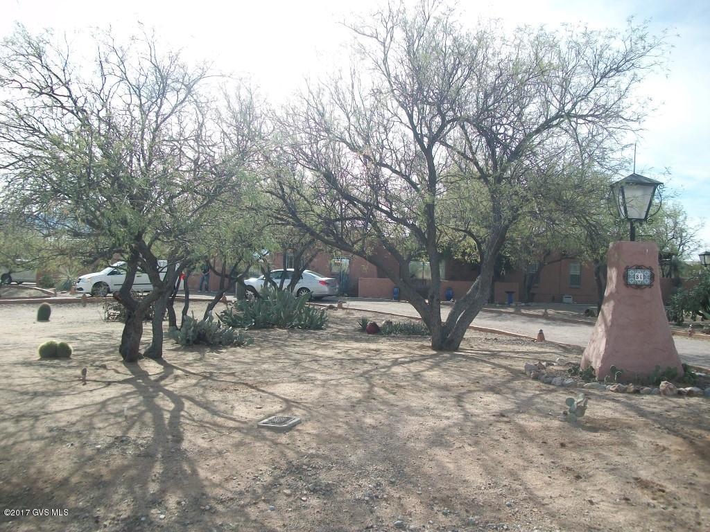 Wonderful Santa Rita Views. Third Bedroom & Bath in Casita. All windows & siding doors have been replaced. All furniture available by SBOS. Kitchen & baths have been updated. Park your RV outside. Use Casita for office or studio. Use garage as workshop if desired. Home is cement block & has been insulated, with foam. Circular drive, extra drive to garages & RV parking. Bee Hive fireplace with insert in living room. raised vanity height & toilets in main home. 2 septic tanks. Kitchen island . Moveable. Gas heat in main house, Heat pump in Casita. All granite counter tops in main home.