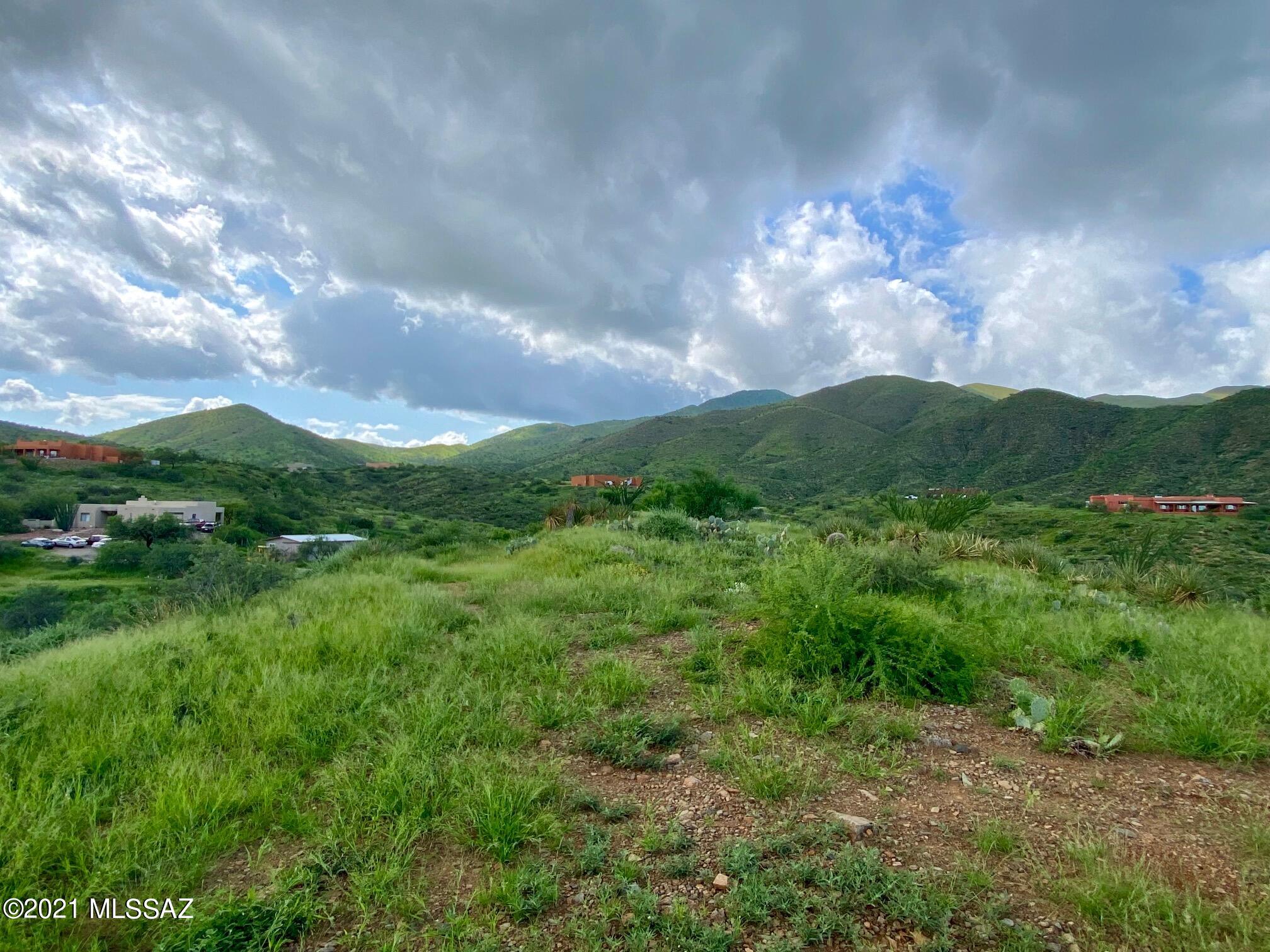 This is literally heaven in Tucson. Mountain Ridge top property so you can build a home and be King or Queen of the Mountain overlooking the land below. Sunsets are fabulous from this location and the Stars are plentiful at night! 5 acre of land with gorgeous custom homes all around. Property will need a septic and well drilled OR you can do water delivery. Electric is at the lot line! If there is a will there is a way, and you could create your dreams in the Santa Rita Mountains of Corona De Tucson right here on this lot.