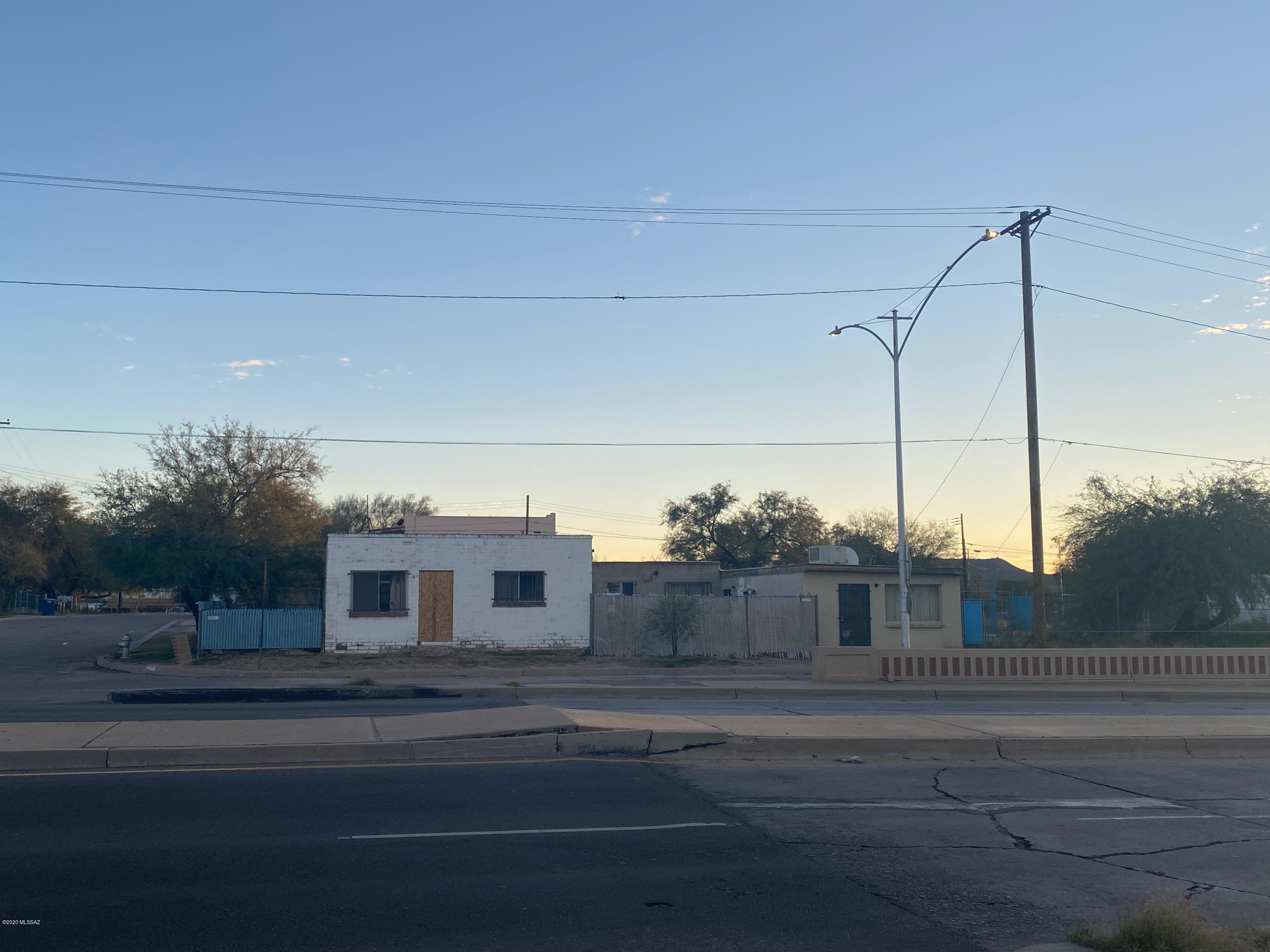 Fix up property.  the property consists of two C-3 zoned lots. Two buildings. in need of complete rehabilitation or tear down and start fresh. West building currently being used as a home. Property being sold As-Is