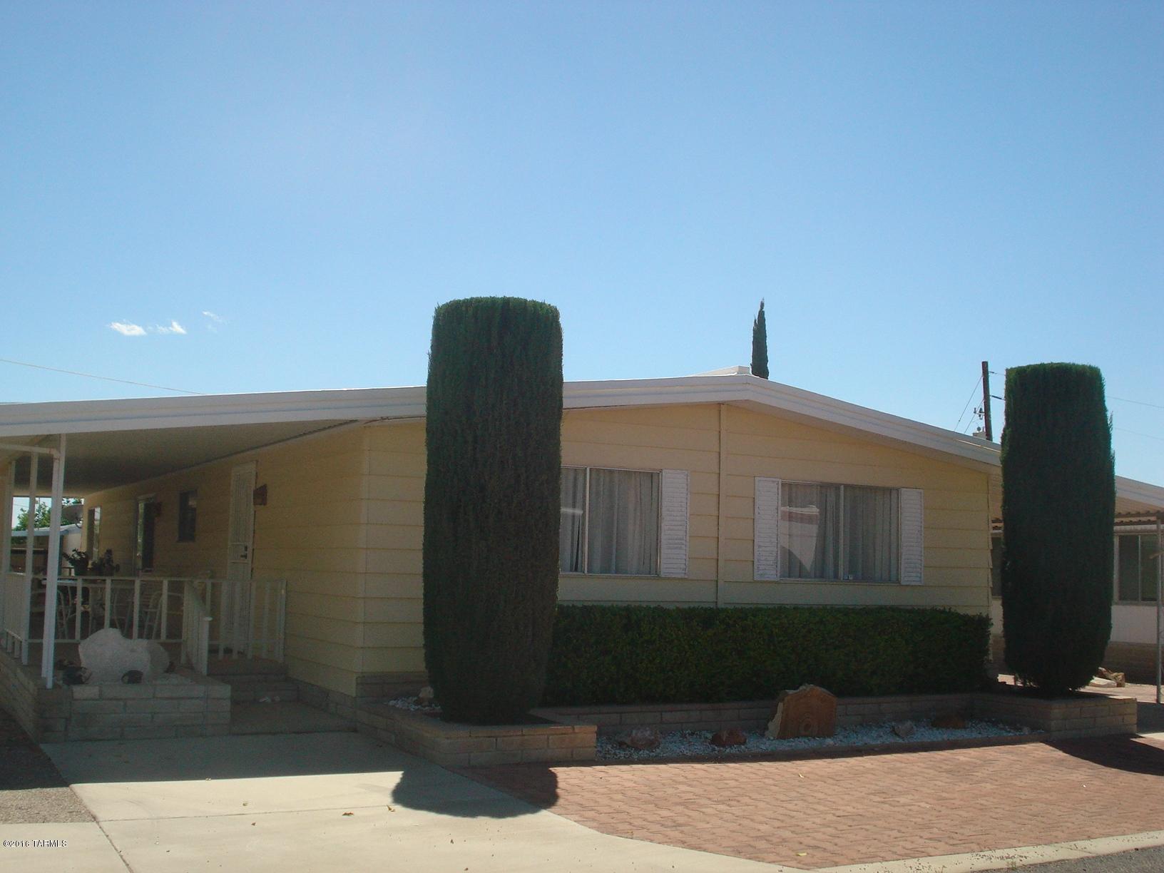 Enjoy the great mountain views from your raised patio.  This 2 bedroom, 2 bath home is north facing.  Open floor plan with family room off kitchen.  Come take a look. Enjoy Tucson Estates ''55'' Community with all it's amenities. swimming Pools, Spa, Golf, Tennis, Exercise facilities, Shuffleboard and much more.