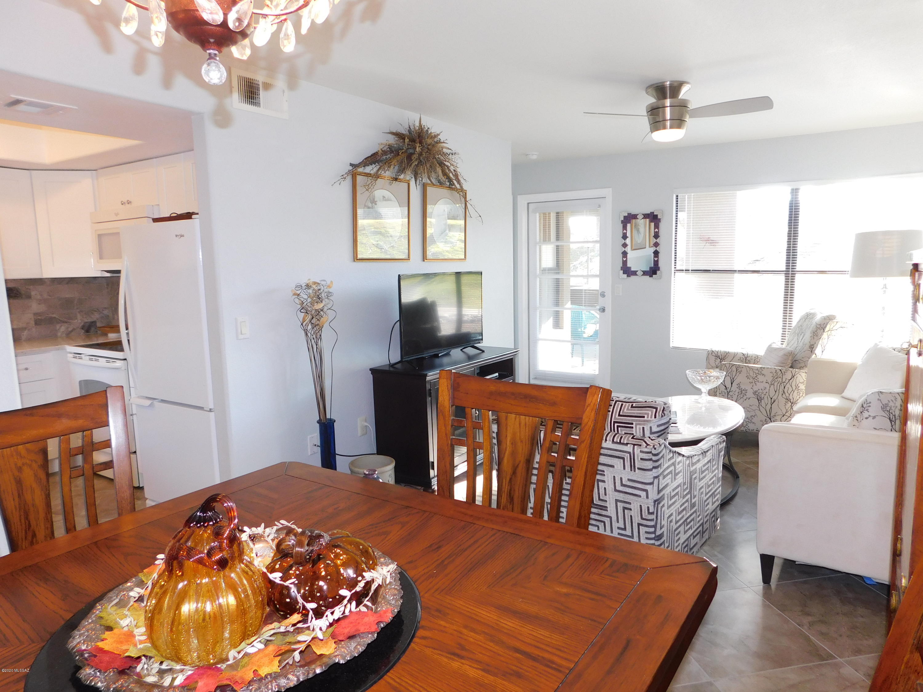 COMPLETELY REMODELED FIRST FLOOR LUXURY CONDOMINIUM. SPLIT FLOORPLAN.  KITCHEN HAS BEEN RECONFIGURED (NO CORNER SINK). FARMHOUSE SINK AT THE WINDOW.
ALL CUSTOM GRANITE COUNTER TOPS THROUGHOUT. BEAUTIFUL 16'' DIAGONAL TILE FLOORING. LIGHT & BRIGHT - THIS HOME HAS GREAT ENERGY. NEW HVAC INSTALLED 4/2019. NEWER WATER HEATER. RESORT STYLE LIVING AT A PRIME VENTANA CANYON LOCATION. GORGEOUS COMMON AREA, 3 POOLS, FITNESS CENTER, CLUB HOUSE. COVERED BACK PATIO IS ON THE GOLF COURSE, BUT SET DOWN AND AWAY FOR PRIVACY. THIS PROPERTY IS ELEGANT AND READY TO ENJOY.